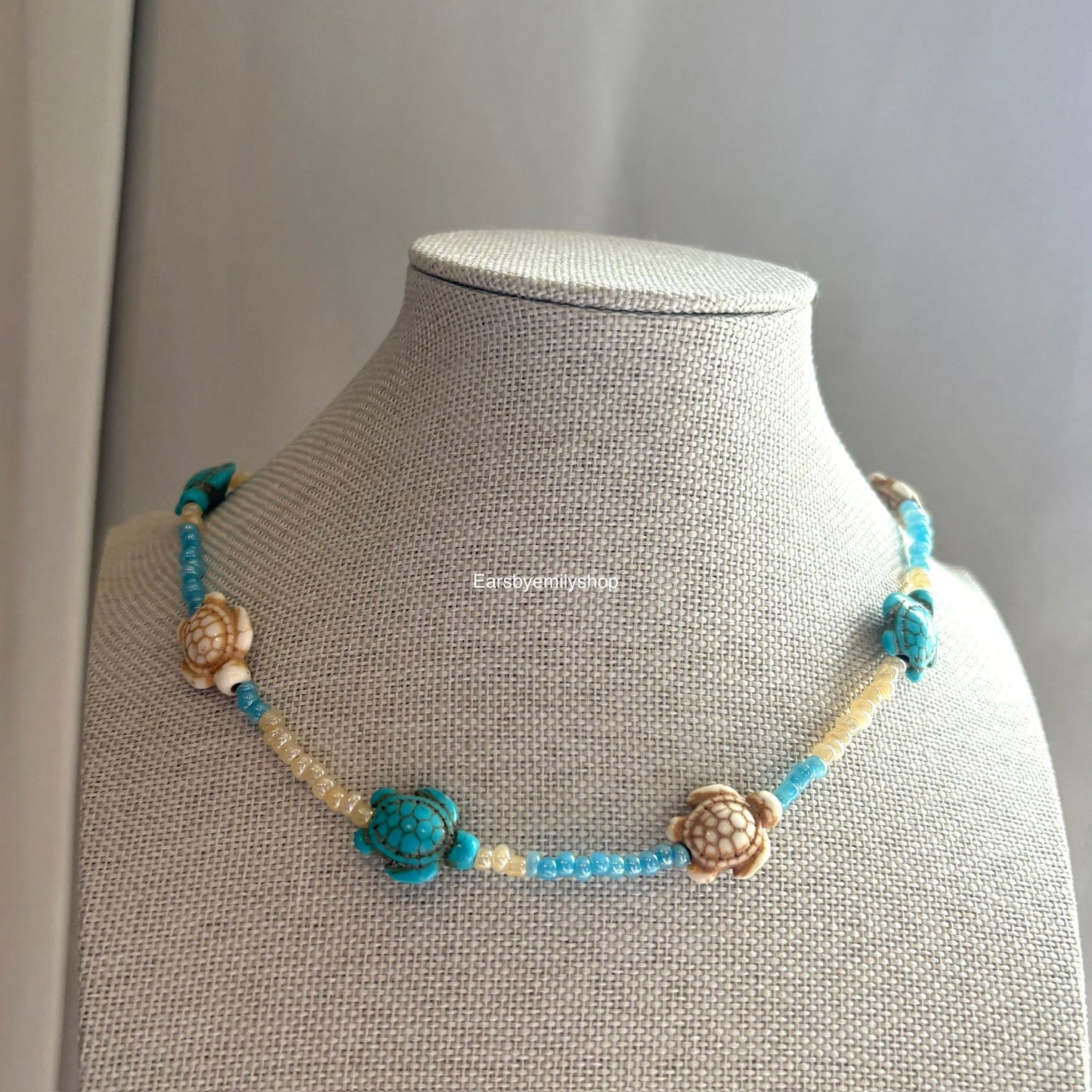 Cool quirky handmade blue and cream beaded beach ocean turtle necklace