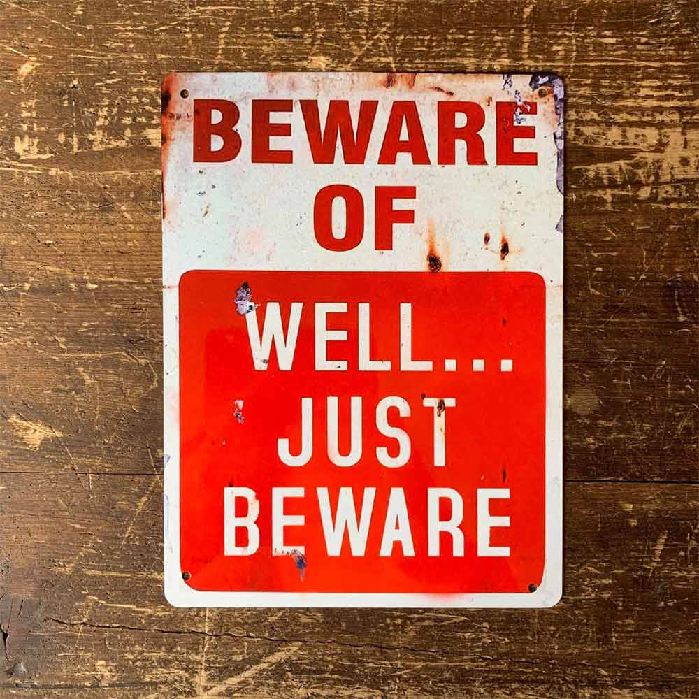 Distressed Effect Beware of Well Just Beware Metal Sign