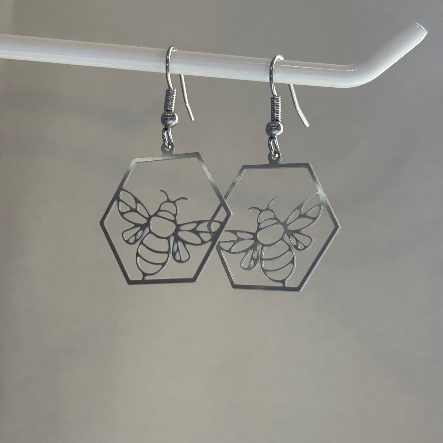 Stainless steel silver hexagon bee earrings