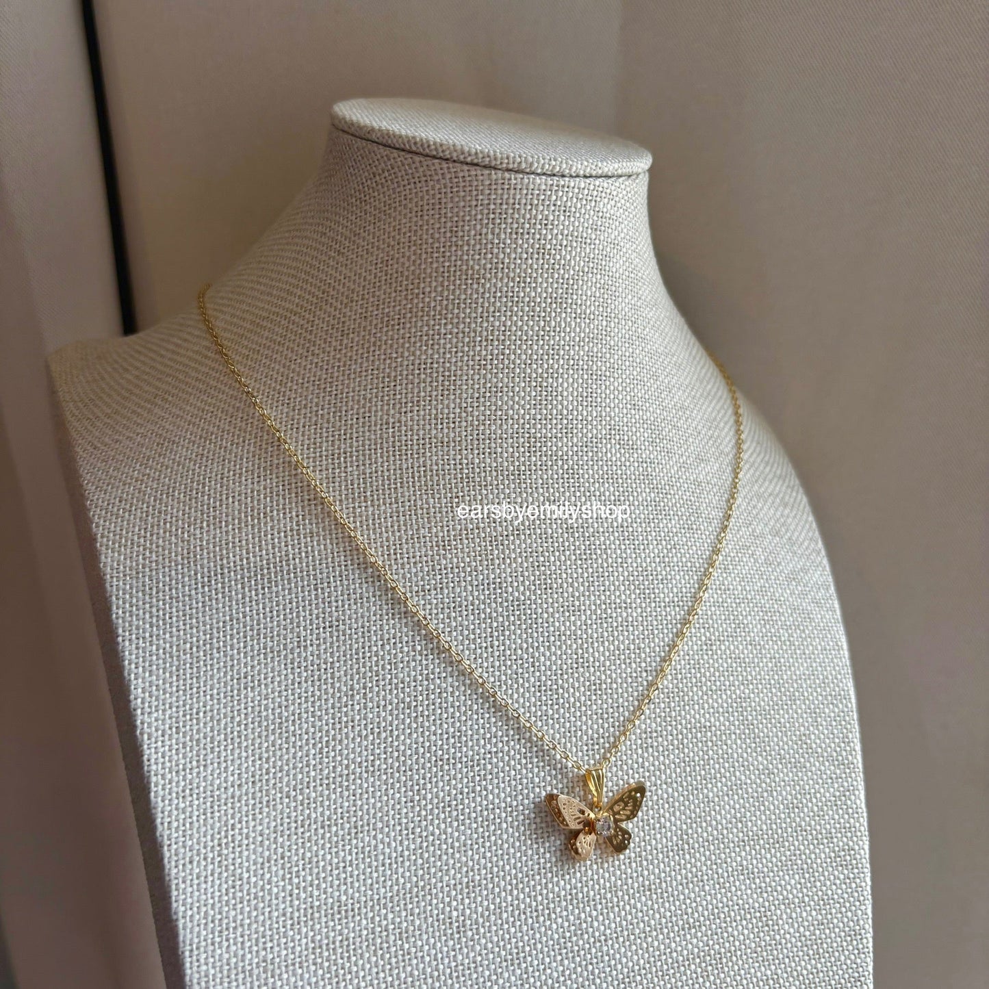 18k gold plated butterfly necklace featuring diamanté design