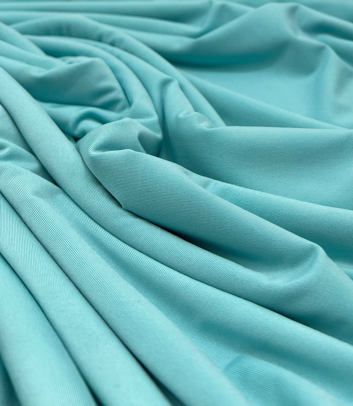 Aqua Blue Plain Shiny Soft Touch Slinky 4 Way Stretch Fabric