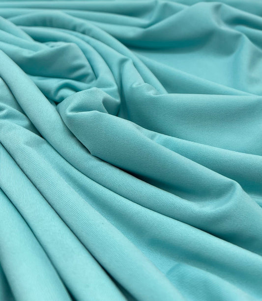 Aqua Blue Plain Shiny Soft Touch Slinky 4 Way Stretch Fabric