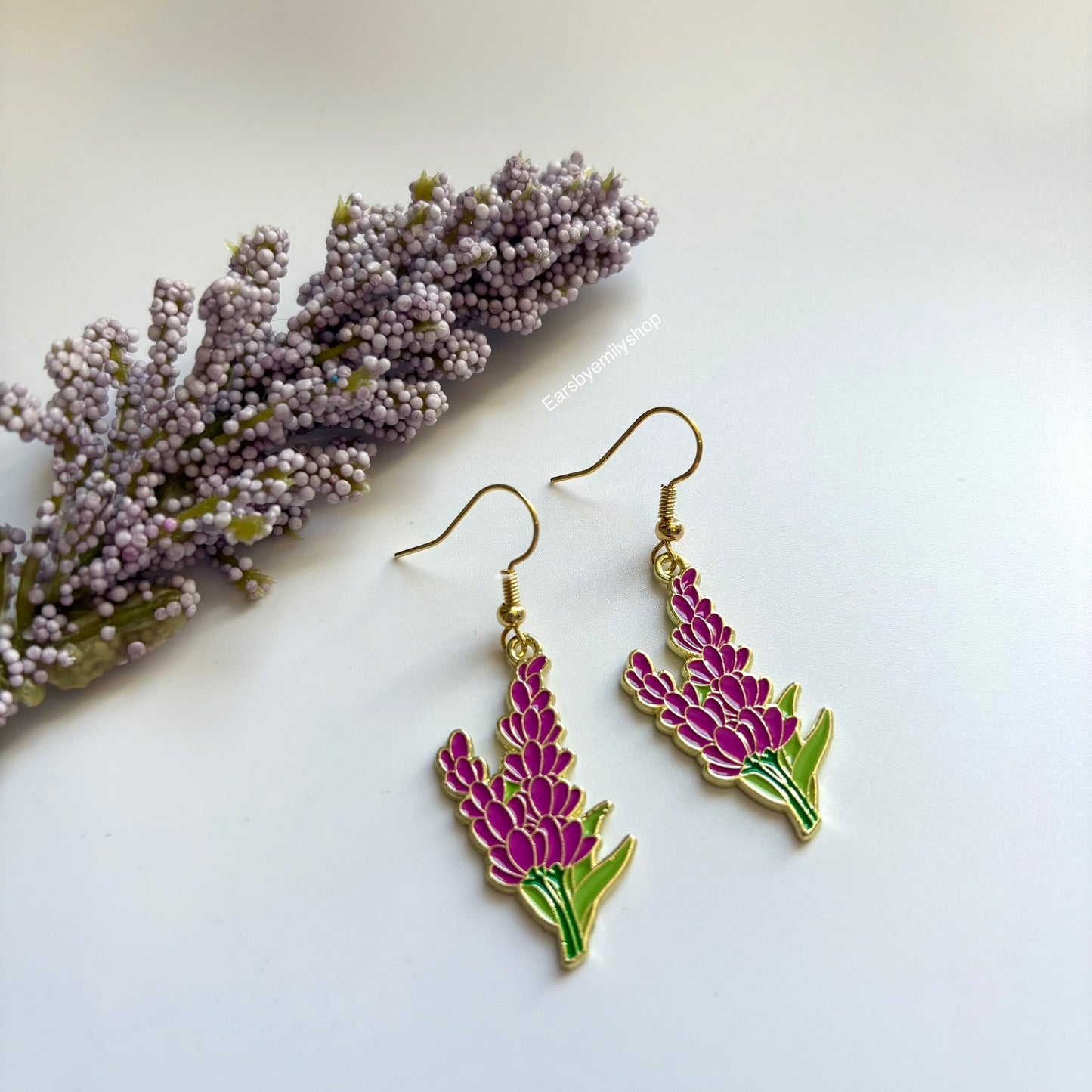 Purple larkspur flower dangle earrings on 18k gold plated hooks