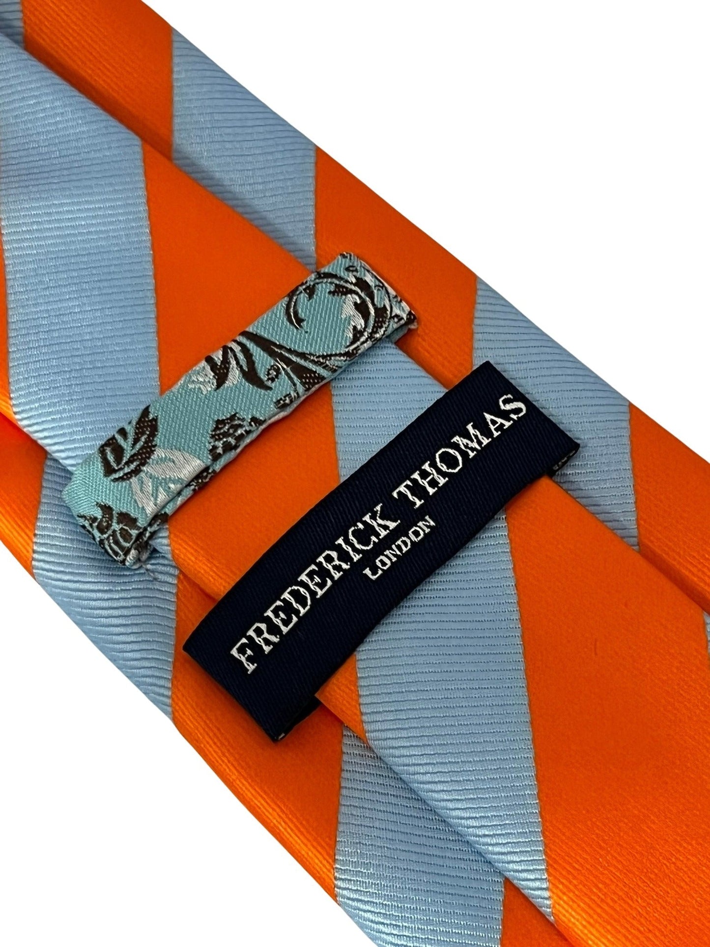 light blue and orange barber striped tie