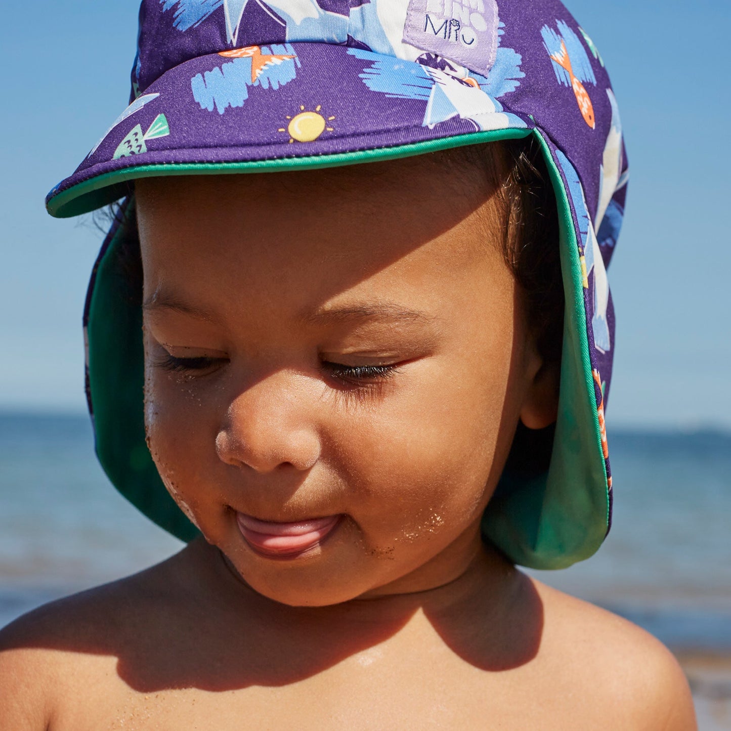 UPF 40+ Reversible Swim Hat for Babies in Wave Patrol