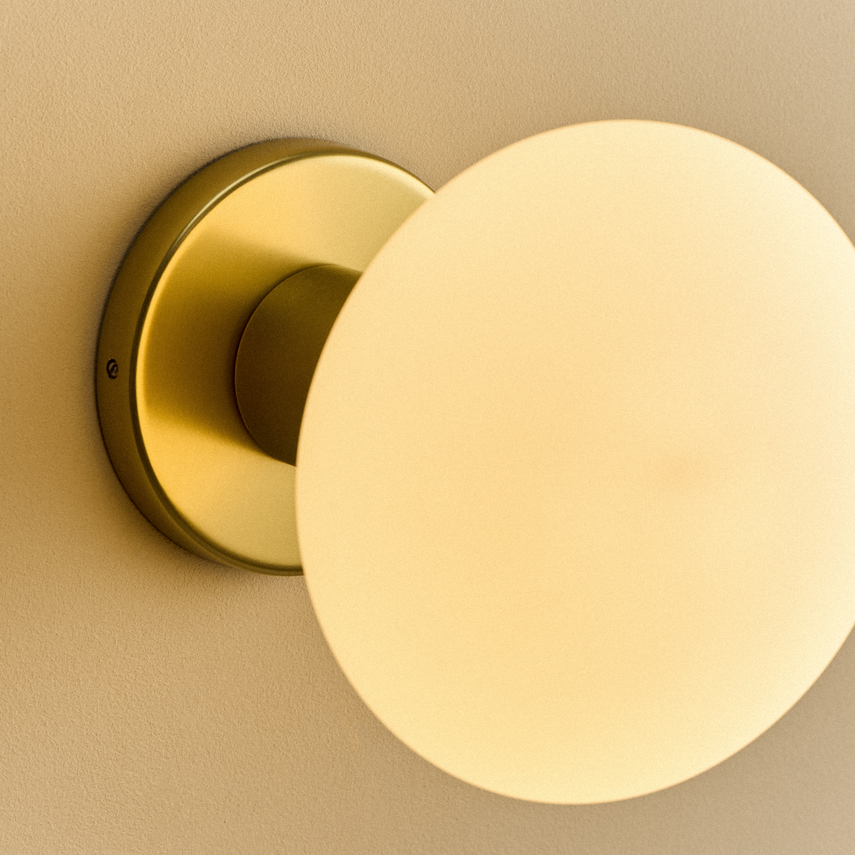 Lochan Wall Light in Brass + Oval Dim to Warm