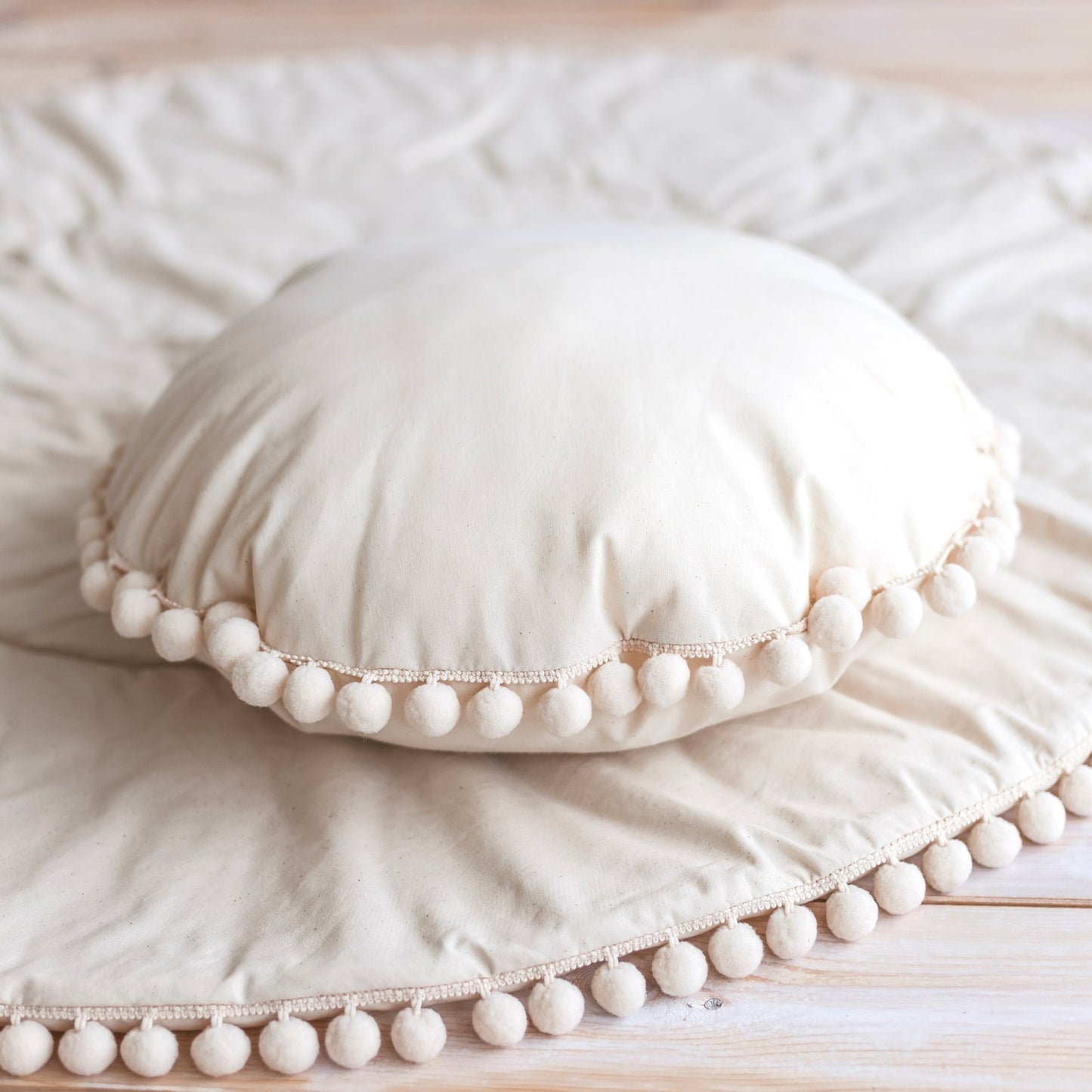MINICAMP Throw Pillow in Ecru with Pompom trim