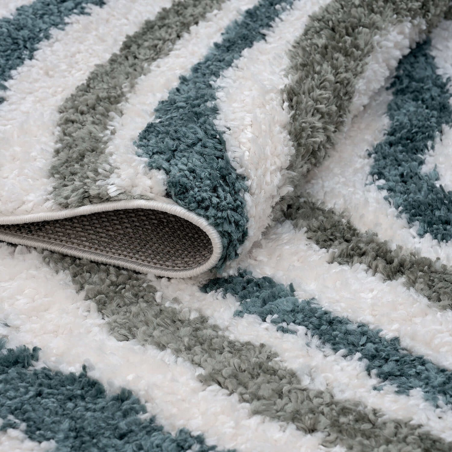 Moodi Shaggy Green Rippletide Rug