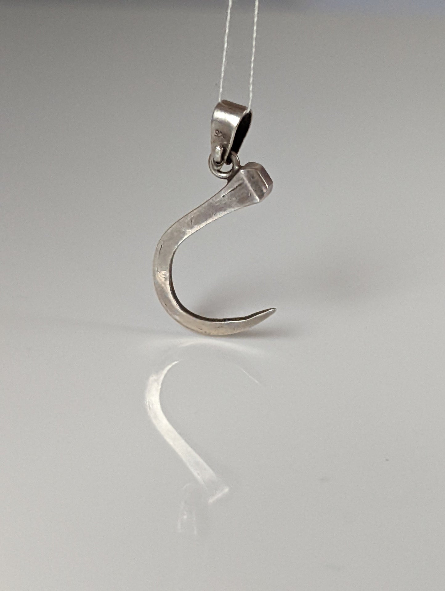 Silver Steed Curved Horseshoe Nail Silver Pendant