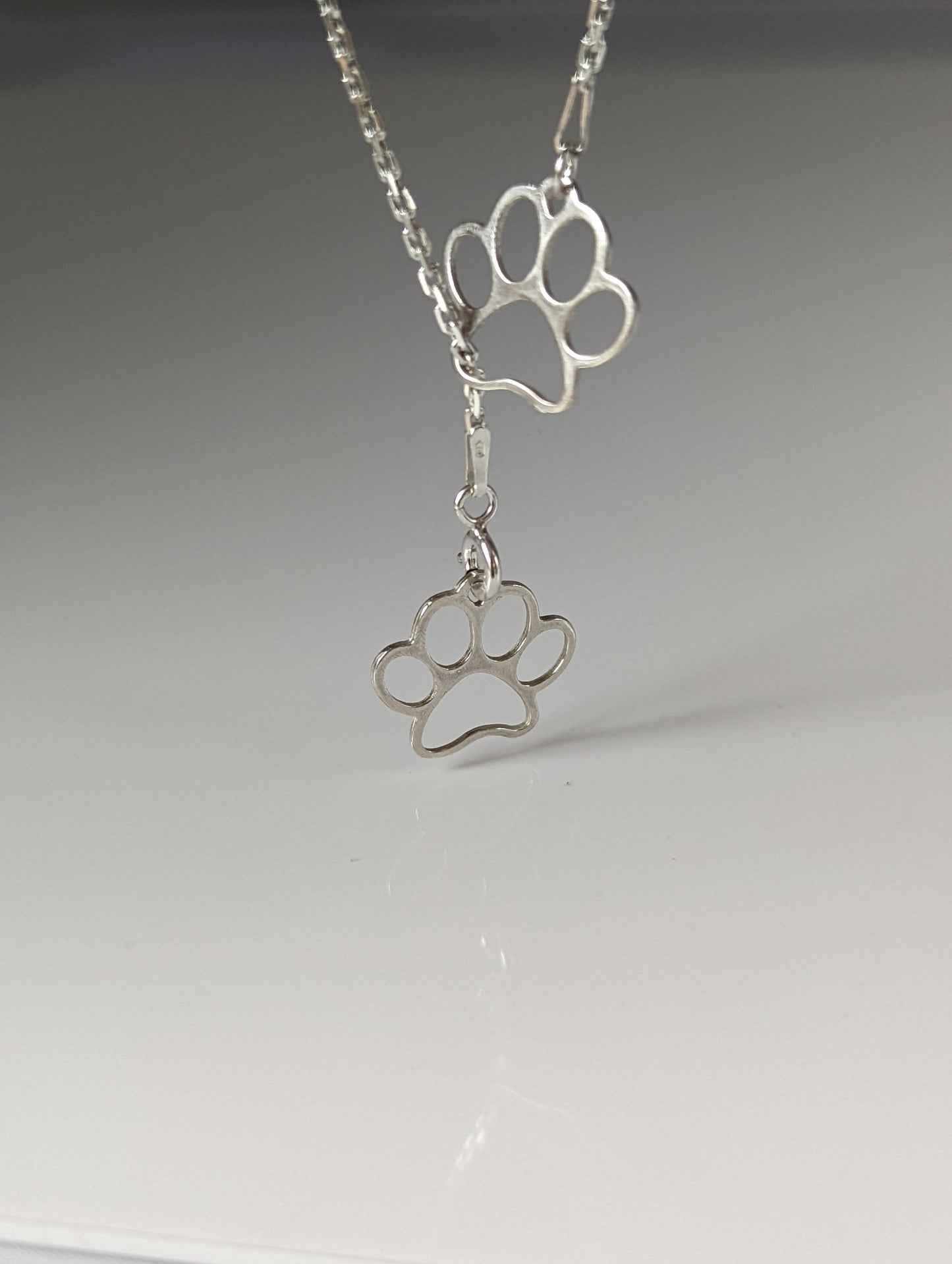 Silver Steed Thread Through Double Paw Print Silver Necklace