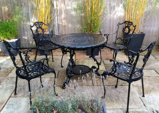 The Foalyard Jardine Leisure Aluminium Victorian Round 94cm Table with Grape Carver Chairs Black Garden Patio Dining Set for Four