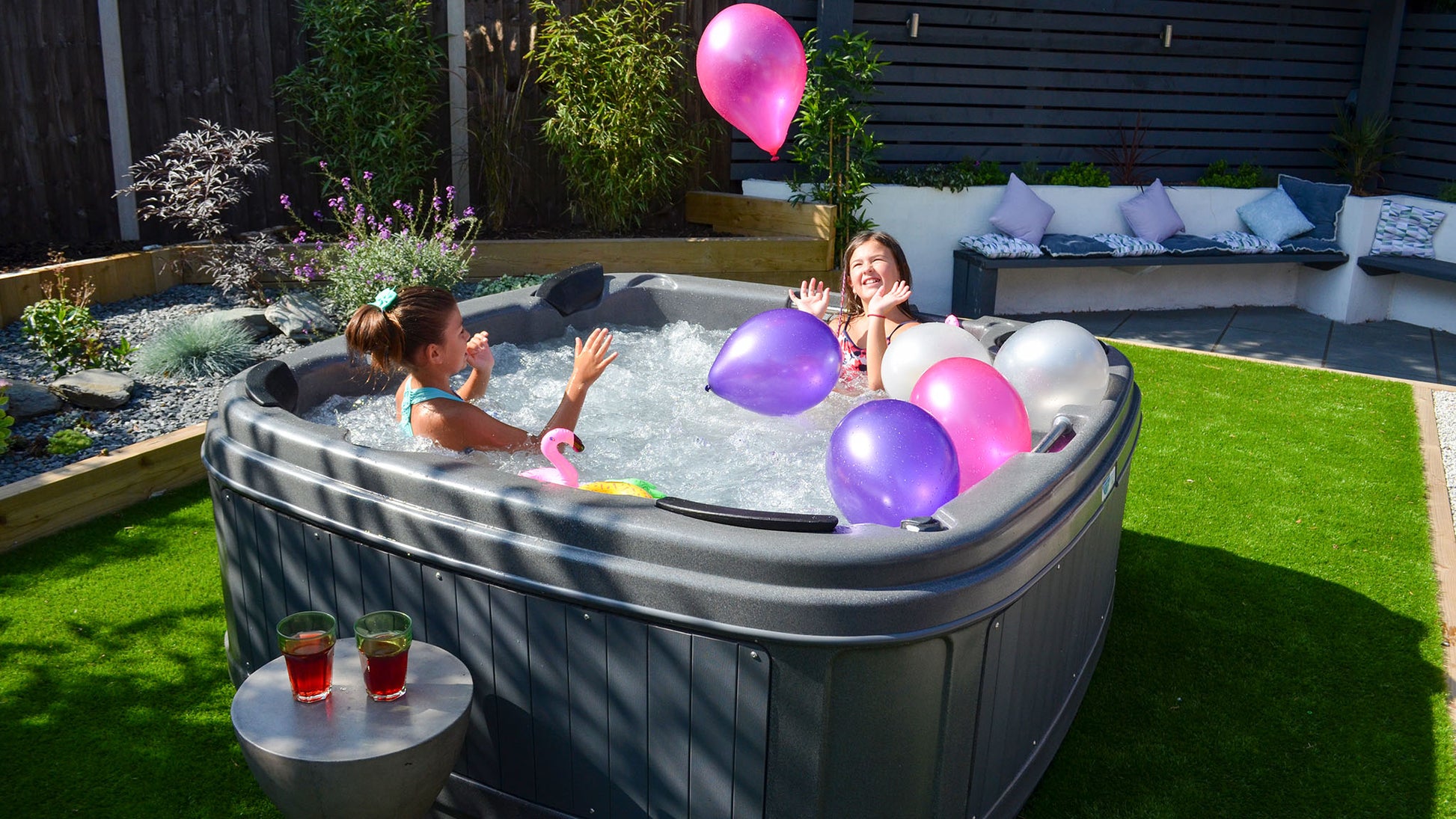 TheFoalyard RotoSpa DuraSpa S380 hot tub Granite Grey with Dark Grey panels - children playing