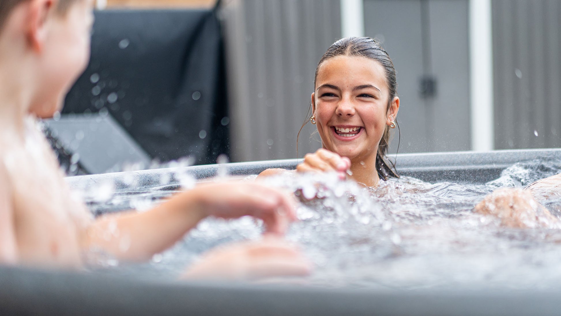 TheFoalyard RotoSpa OrbisSpa hot tub Granite Grey with Dark Grey panels British Made - bubbling water playing home back garden jacuzzi