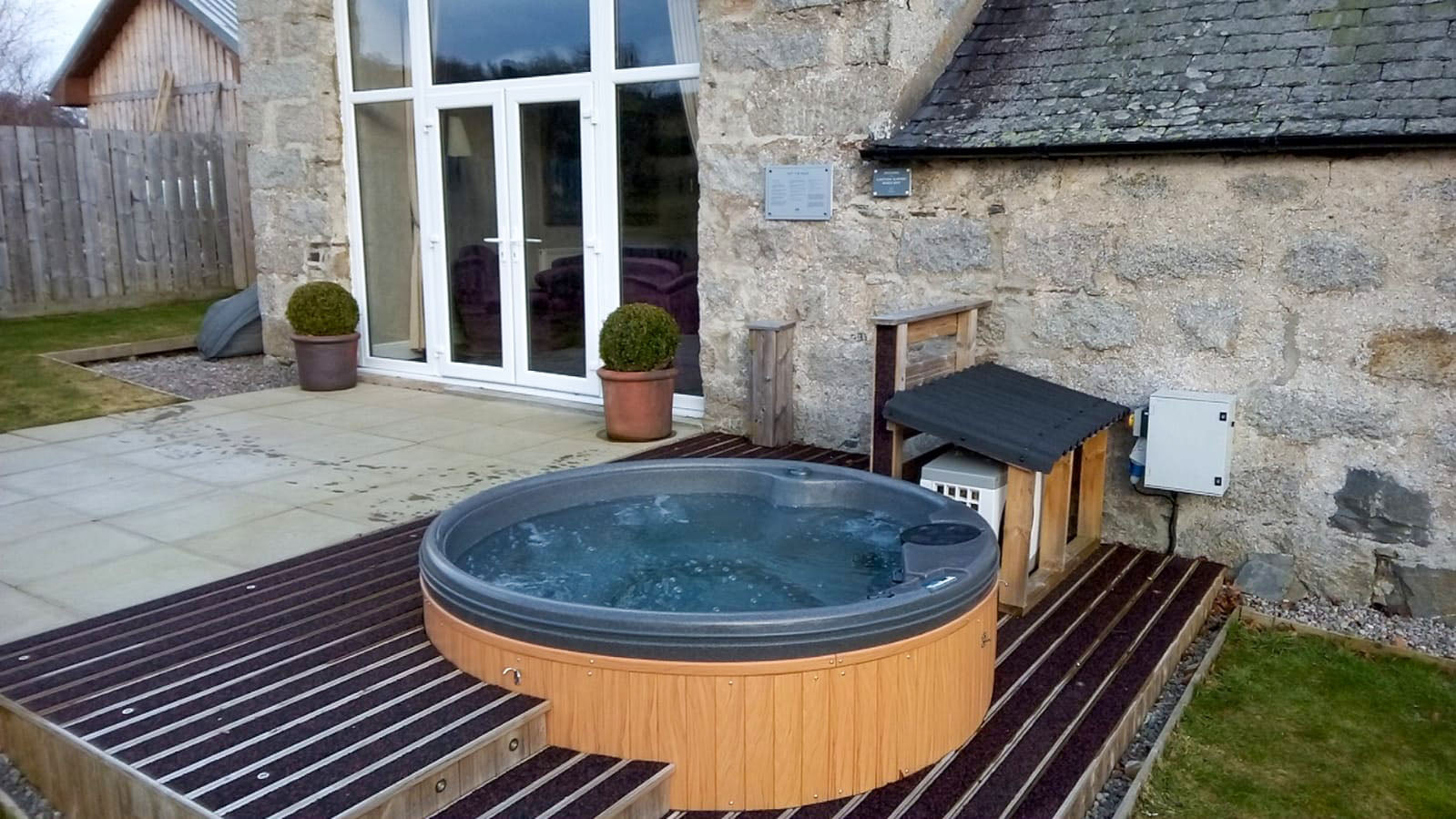 TheFoalyard RotoSpa QuatroSpa British made hot tub Granite Grey shell with Teak panels 5 6 persons - deck built-in jacuzzi