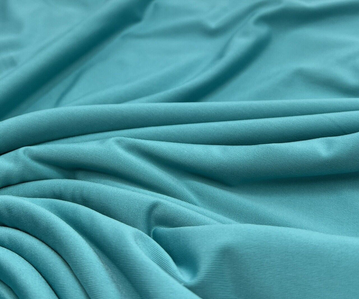 Aqua Blue Plain Shiny Soft Touch Slinky 4 Way Stretch Fabric