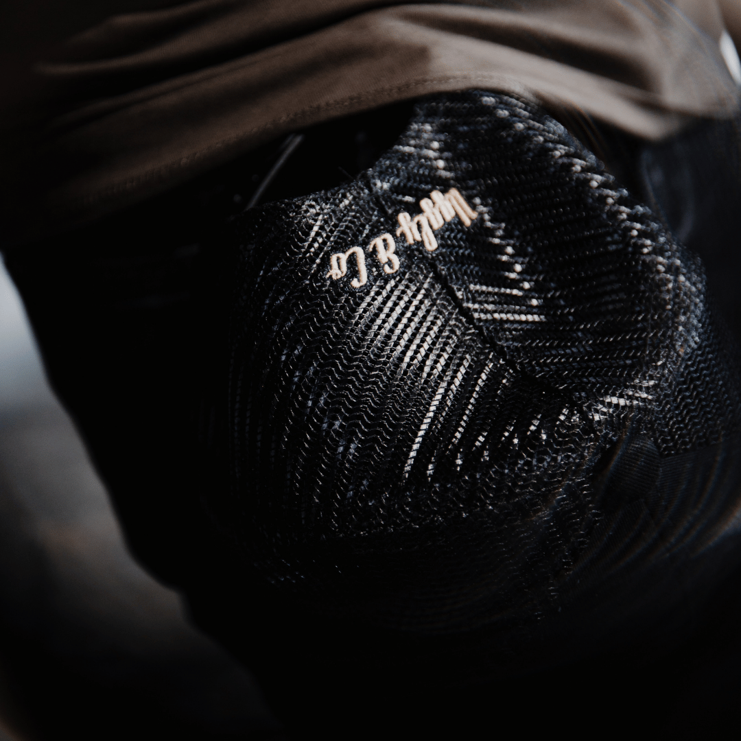 Black Flat Track Trucker Hat