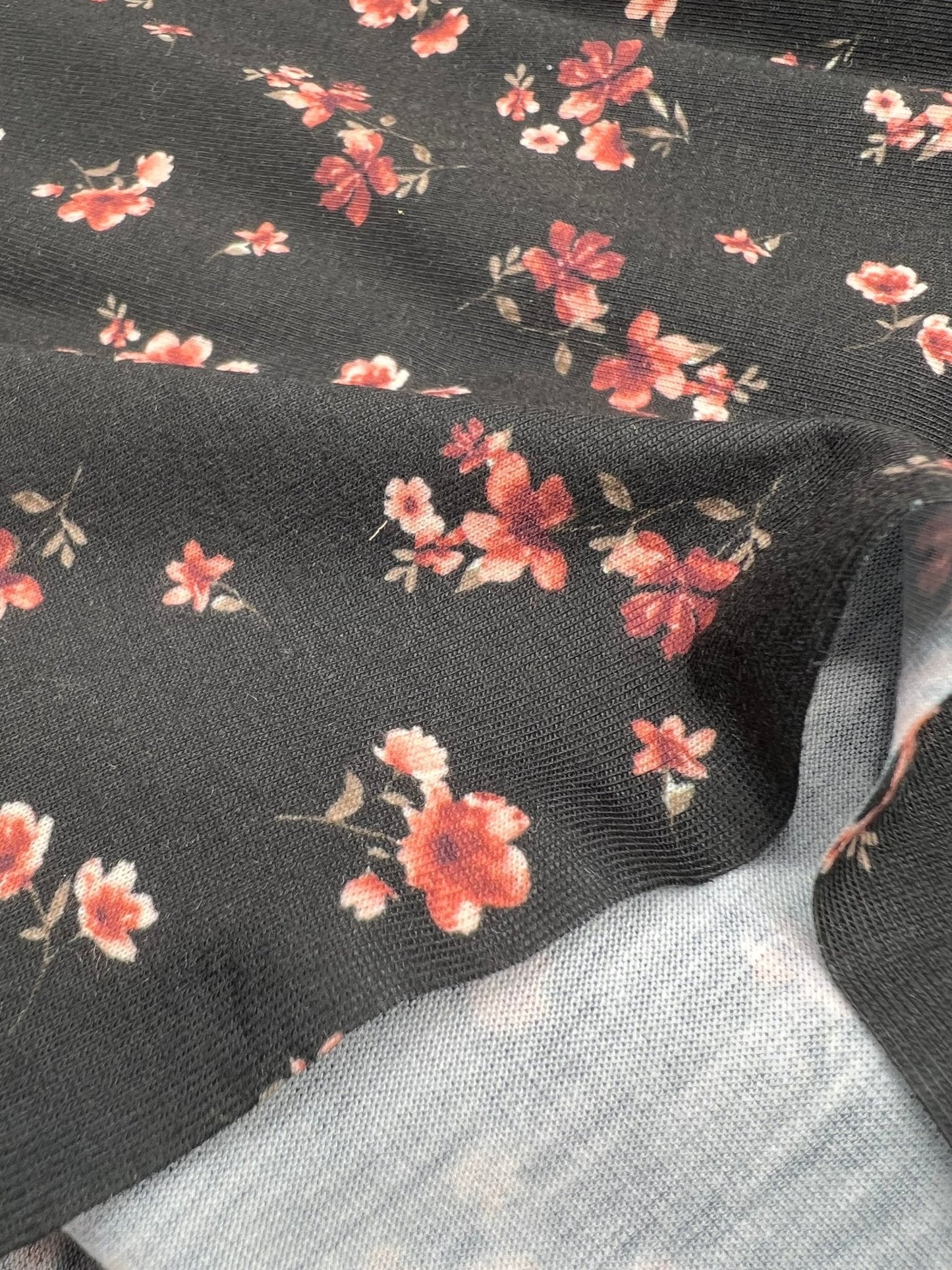 Black Ditsy Floral Rose Print Spun Poly Stretch Fabric
