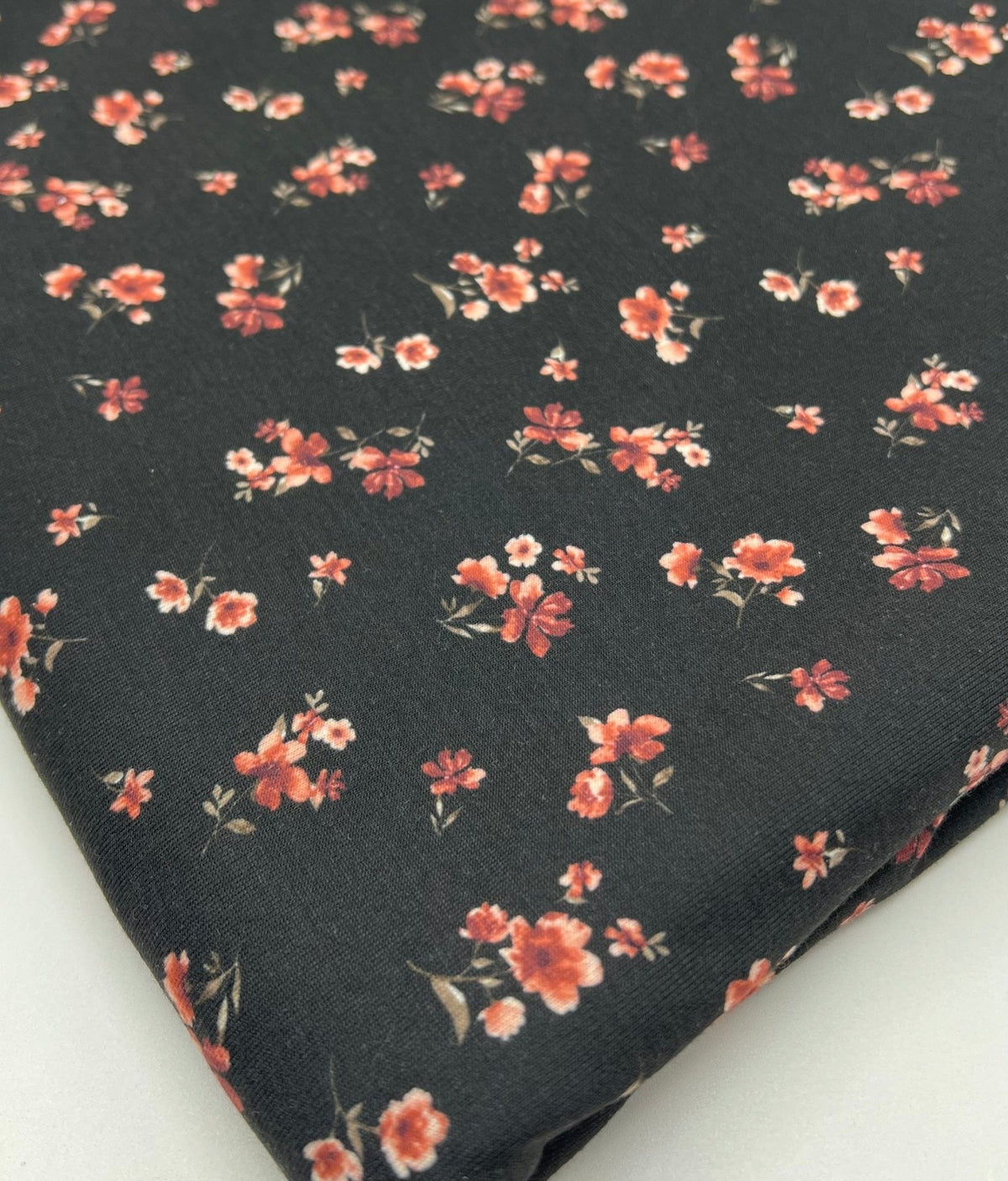 Black Ditsy Floral Rose Print Spun Poly Stretch Fabric