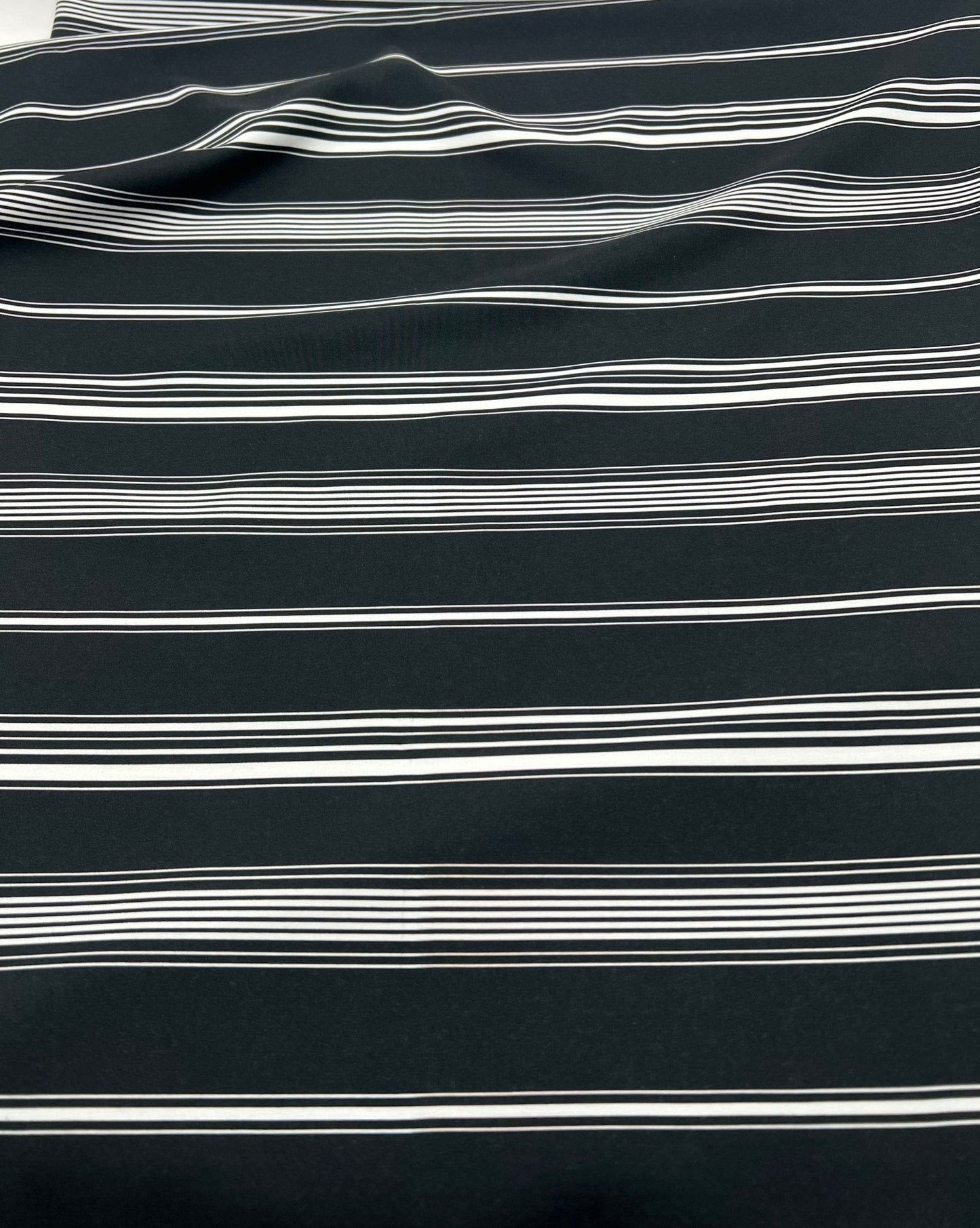 Black Multi Vertical Stripe Lightweight Non Stretch Fabric