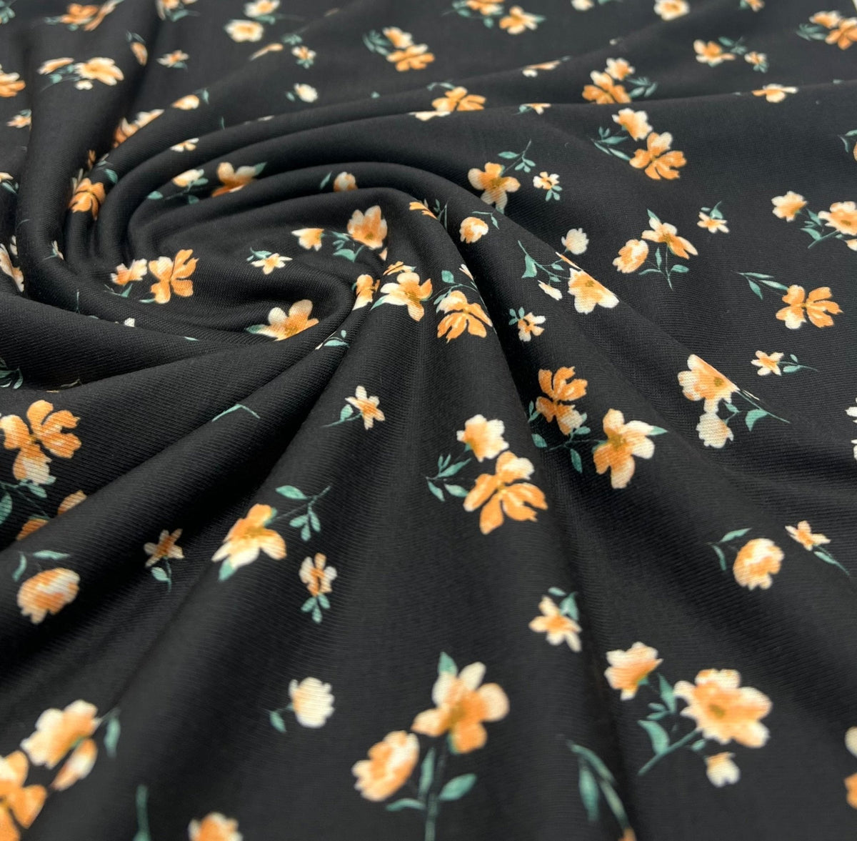 Black Orange Ditsy Floral Print Soft Spun Poly Stretch Fabric