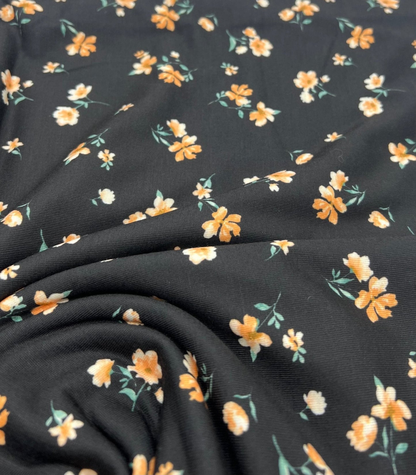 Black Orange Ditsy Floral Print Soft Spun Poly Stretch Fabric