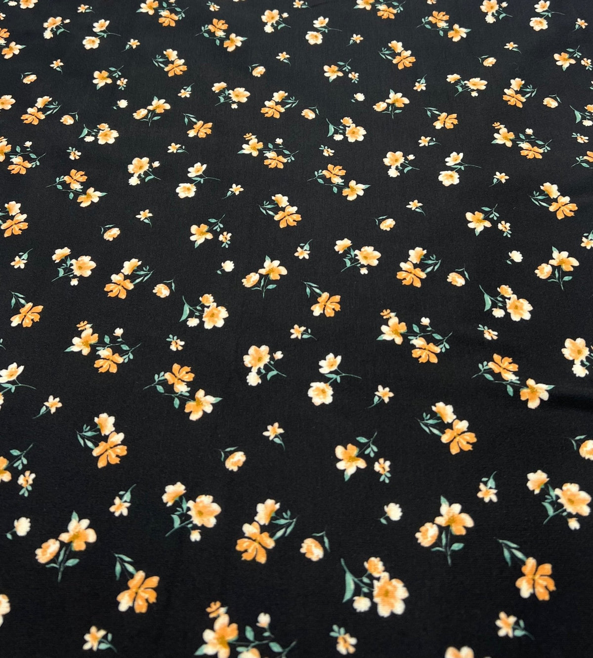 Black Orange Ditsy Floral Print Soft Spun Poly Stretch Fabric