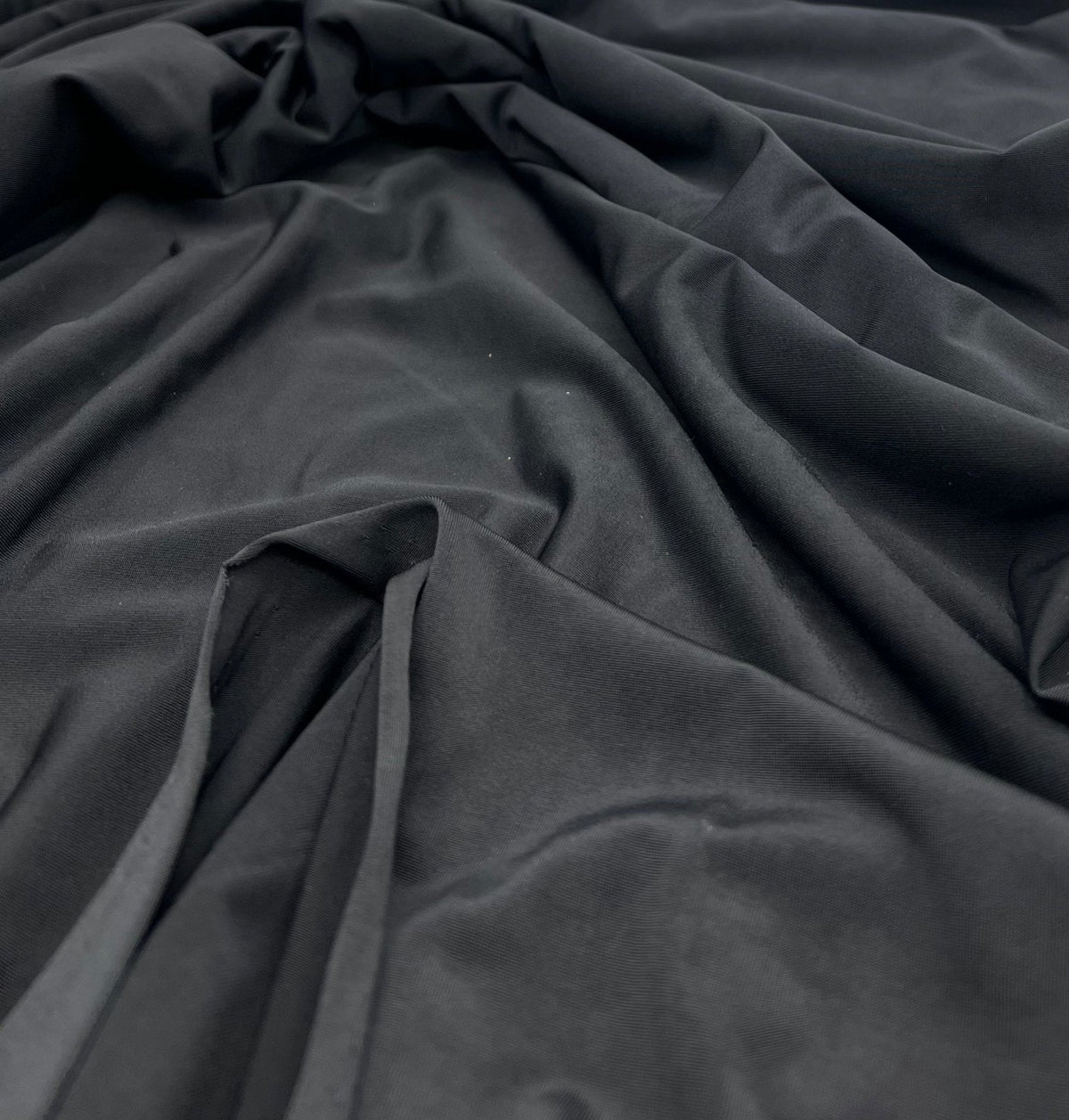 Black Plain Shiny Soft Touch Slinky 4 Way Stretch Fabric