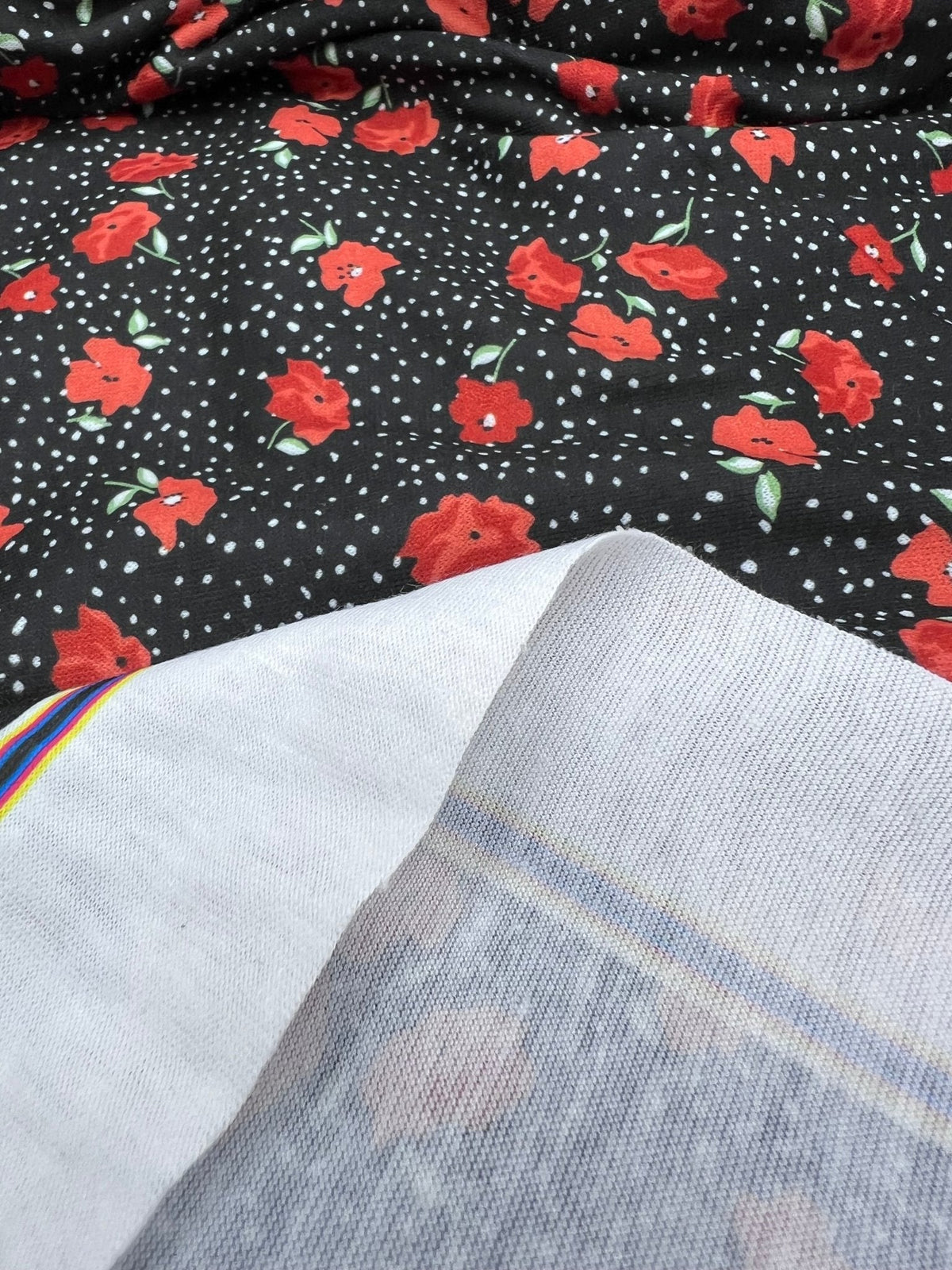 Black Red Poppy Print Spun Poly Stretch Fabric