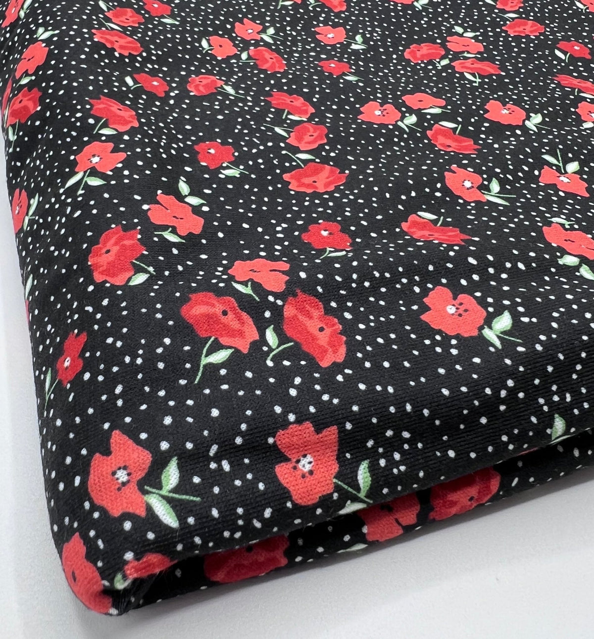Black Red Poppy Print Spun Poly Stretch Fabric