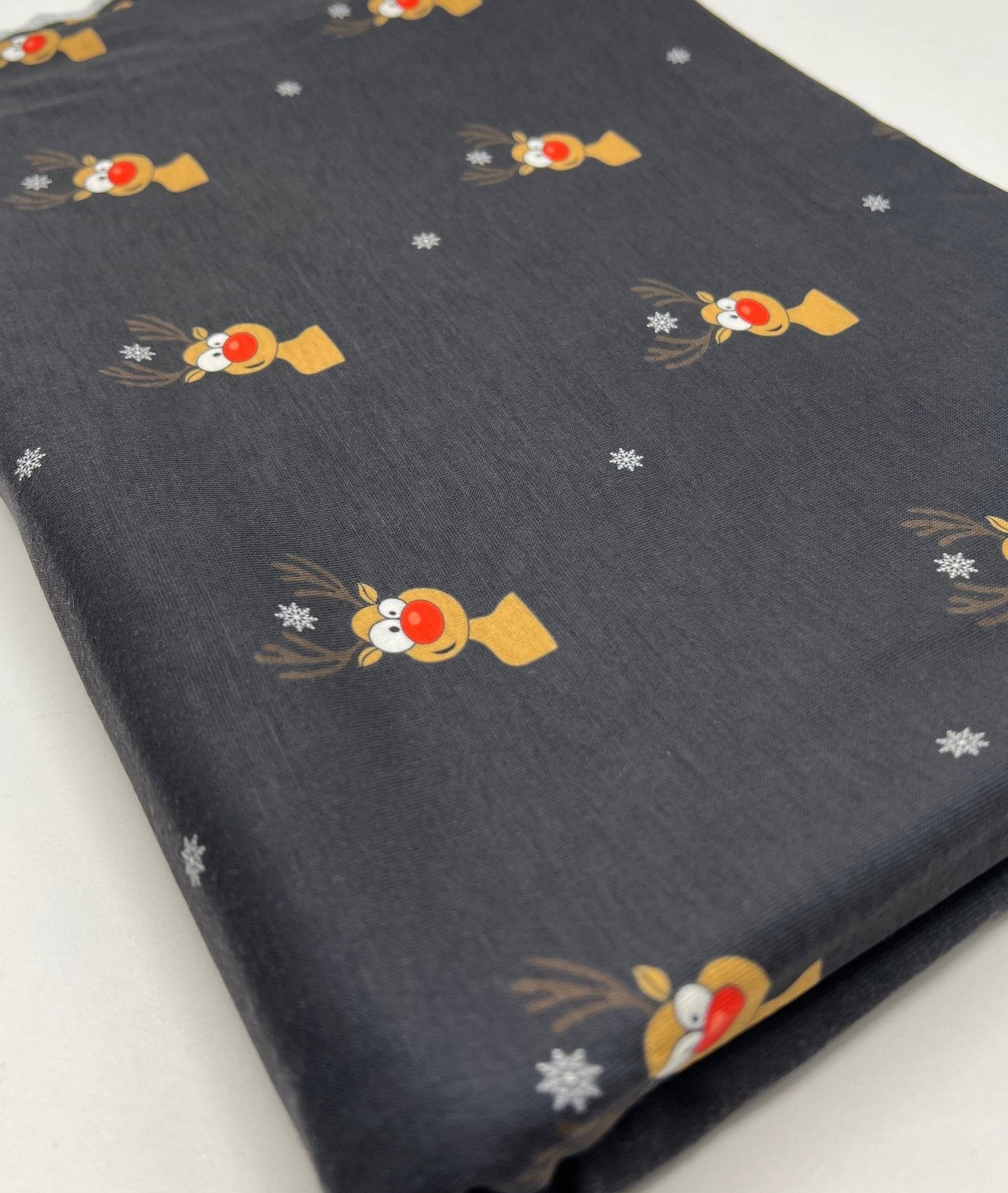 Black Rudolph Print Soft Spun Poly Stretch Fabric