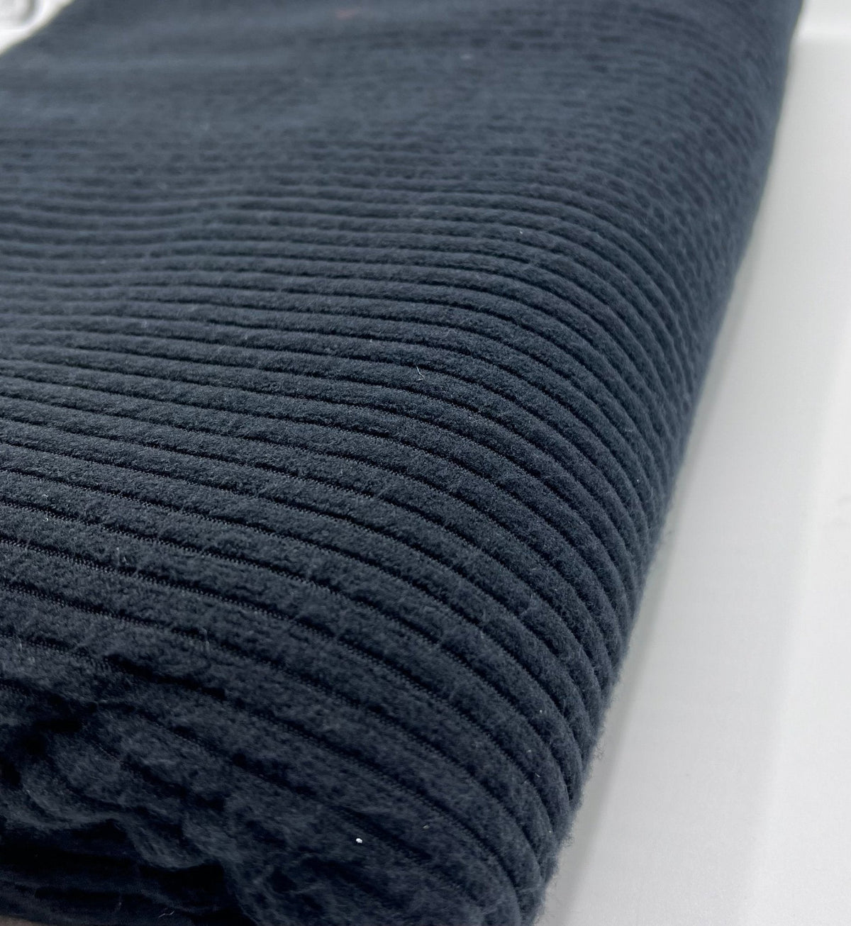 Black Soft Light Brushed Cosy Wide Rib Stretch Fabric