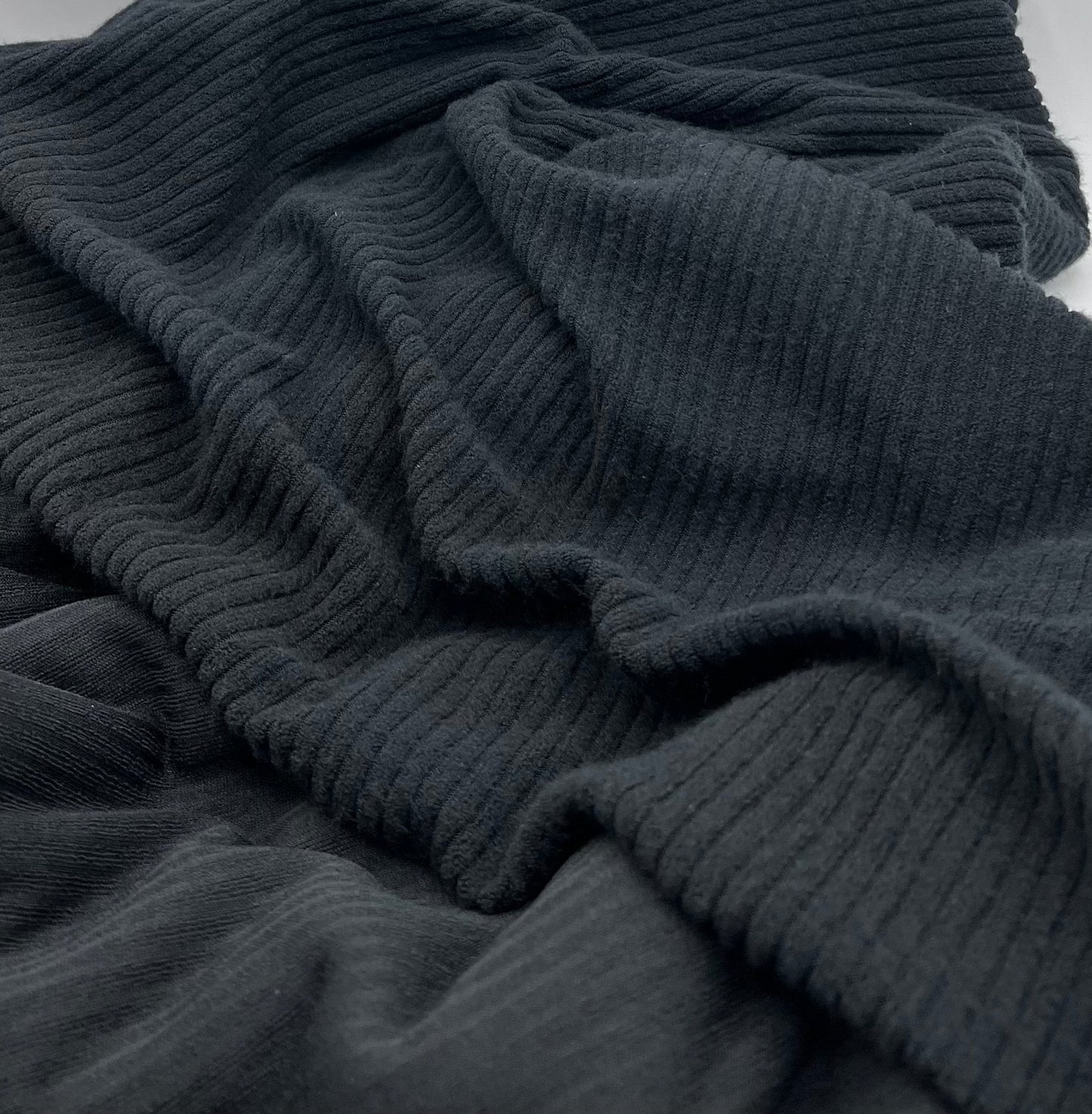 Black Soft Light Brushed Cosy Wide Rib Stretch Fabric