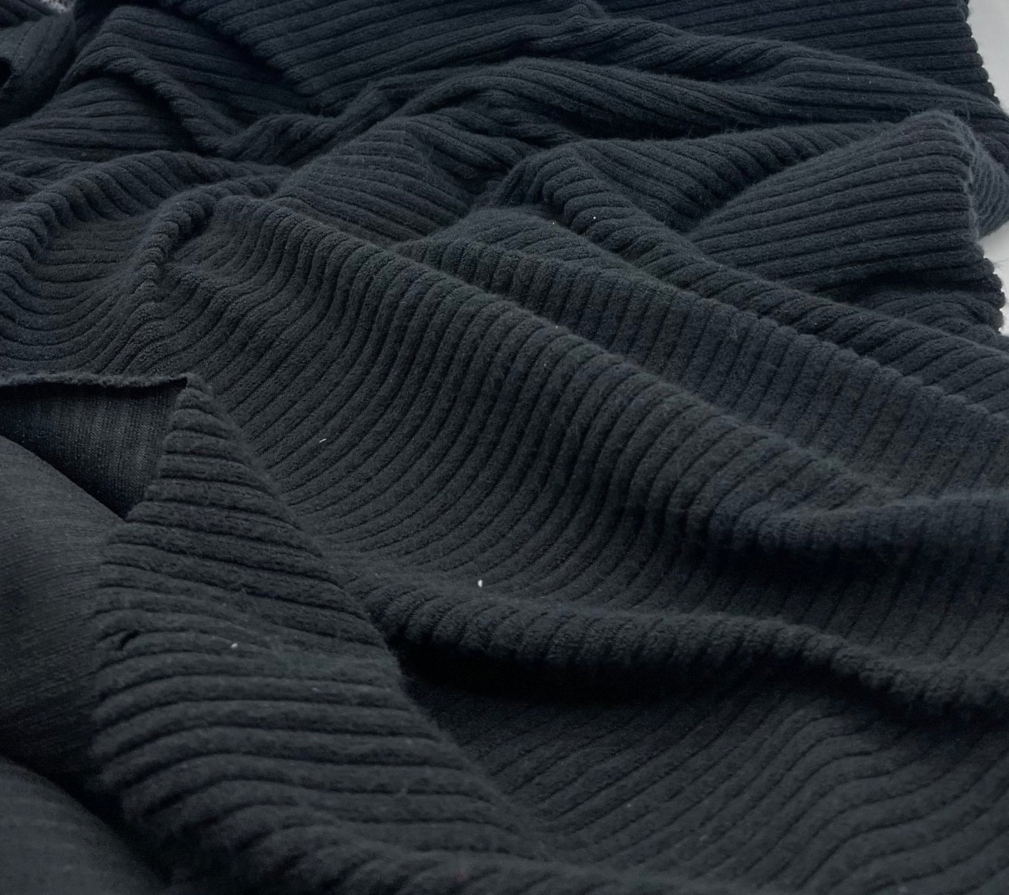 Black Soft Light Brushed Cosy Wide Rib Stretch Fabric