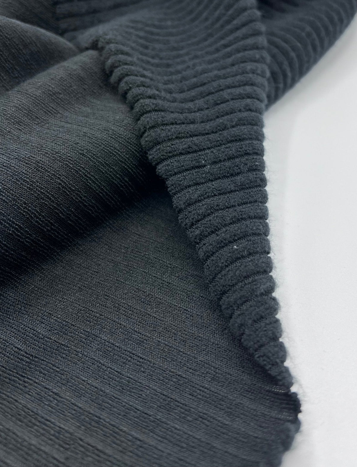 Black Soft Light Brushed Cosy Wide Rib Stretch Fabric