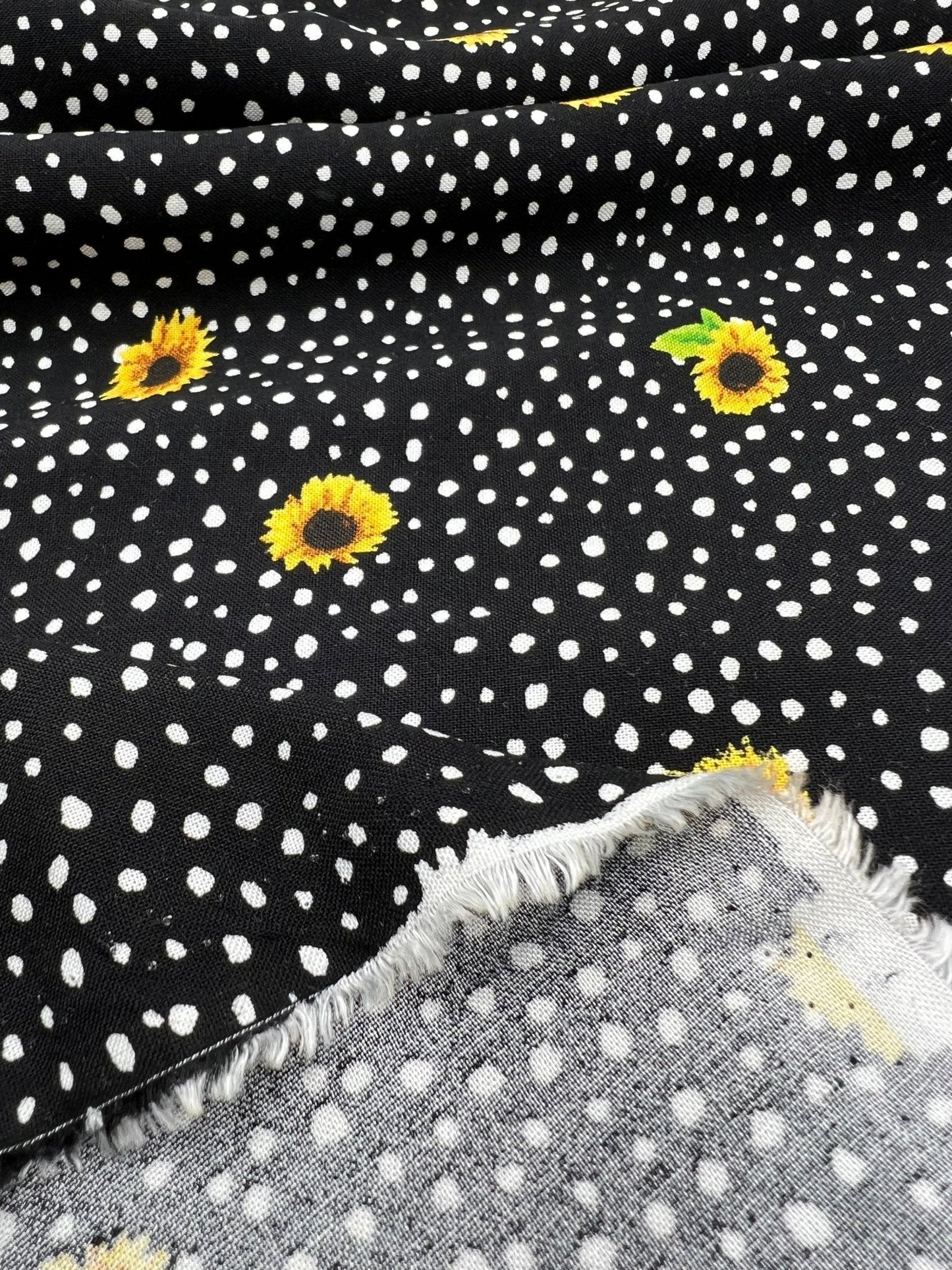 Black Spot Sunflower Lightweight Non Stretch Woven Fabric