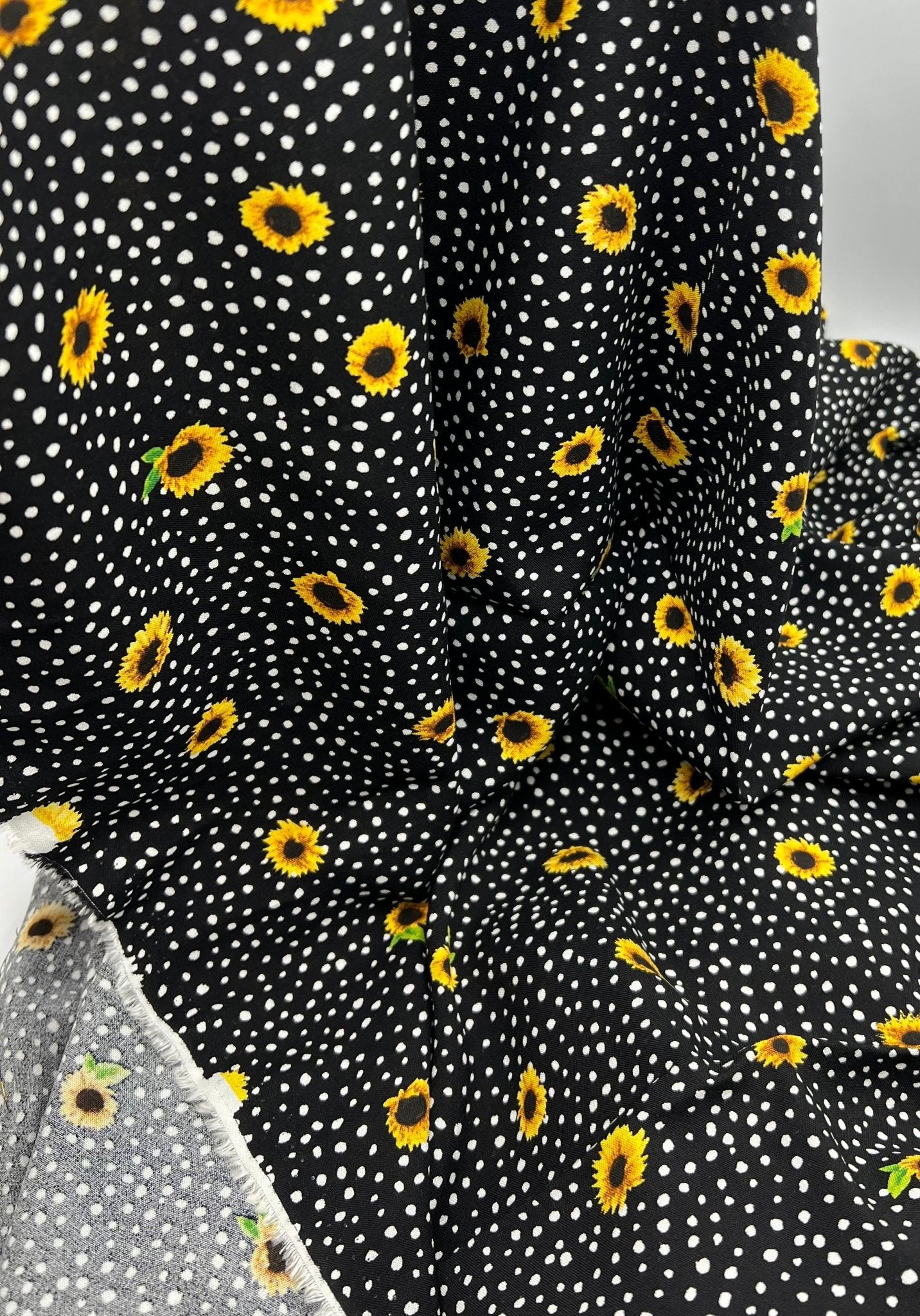 Black Spot Sunflower Lightweight Non Stretch Woven Fabric