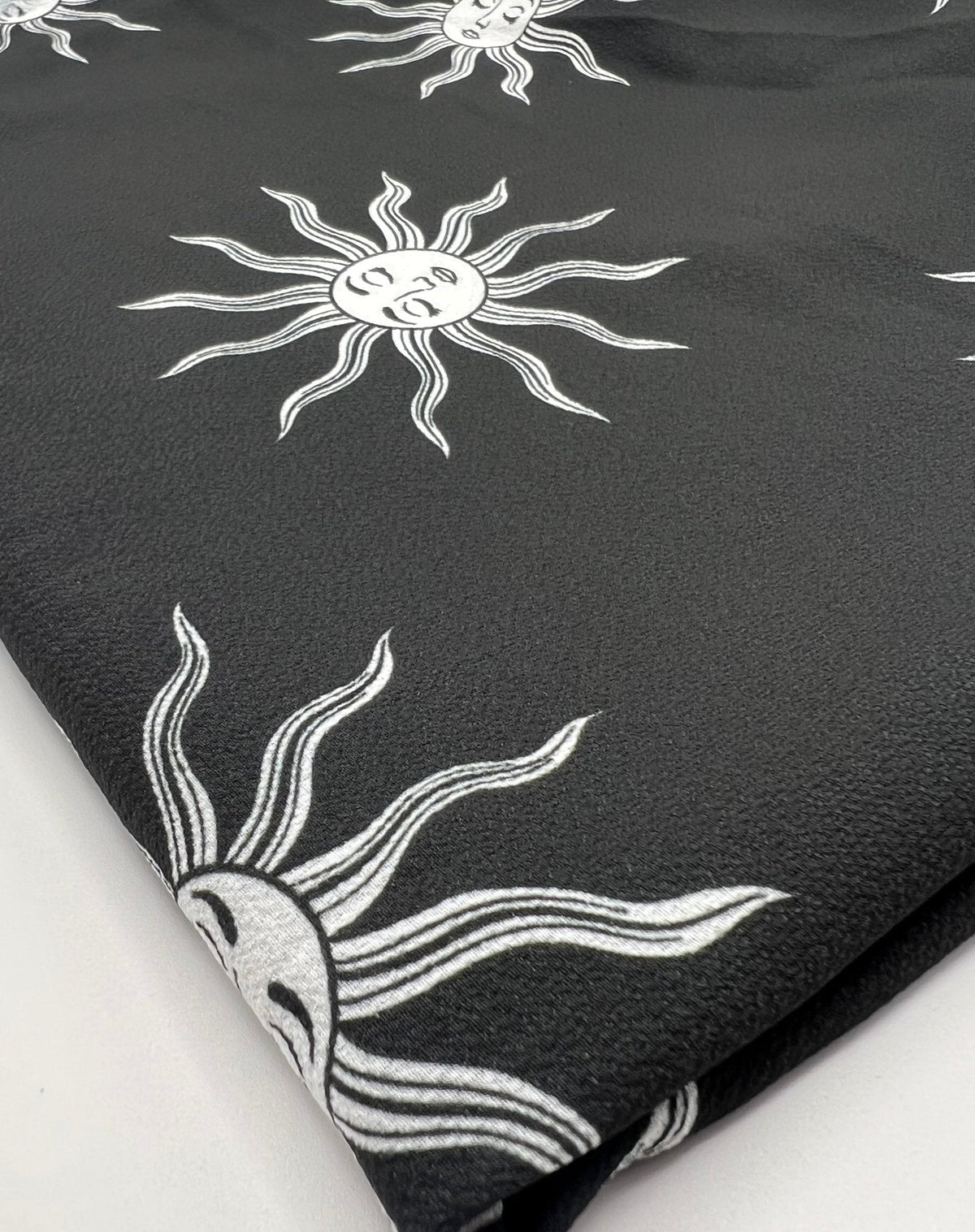 Black Sun Print Lightweight Bubble Crepe Fabric