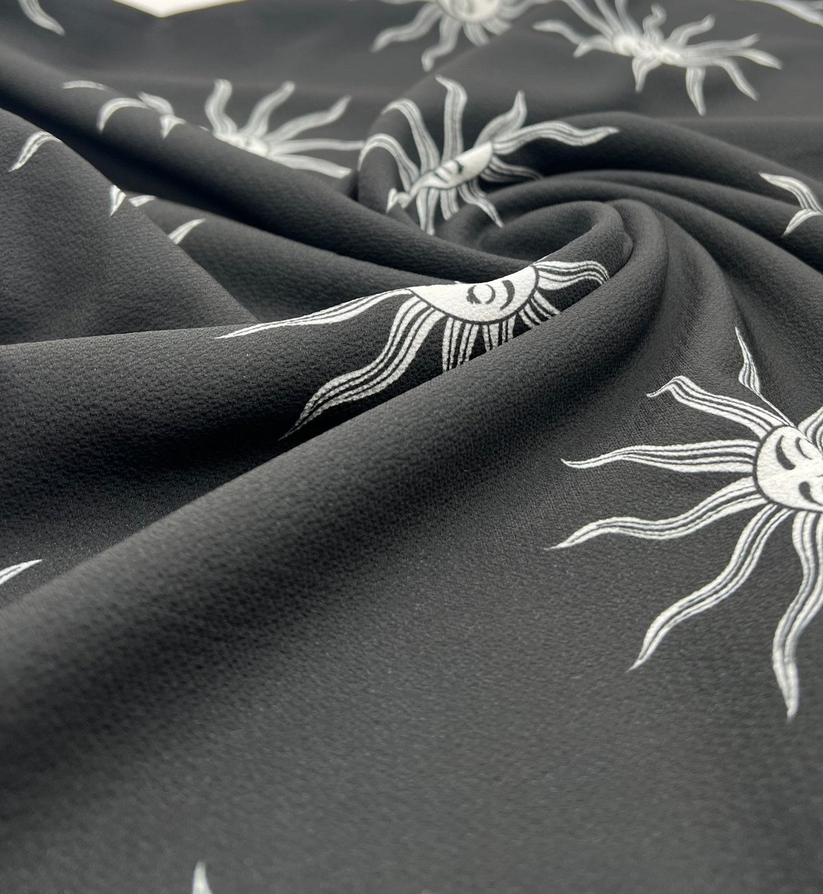 Black Sun Print Lightweight Bubble Crepe Fabric