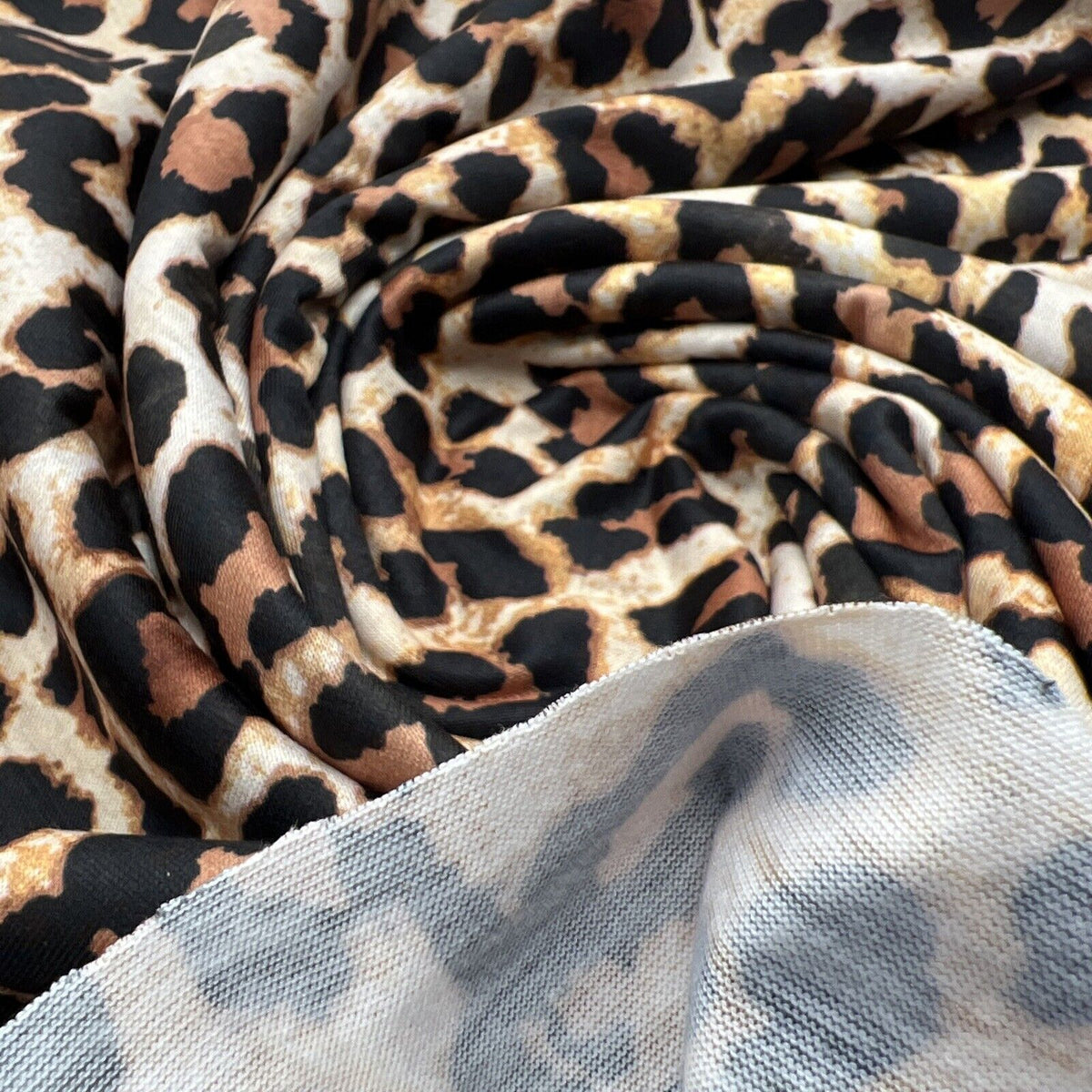 Black Tan Animal Print Spun Poly Stretch Fabric