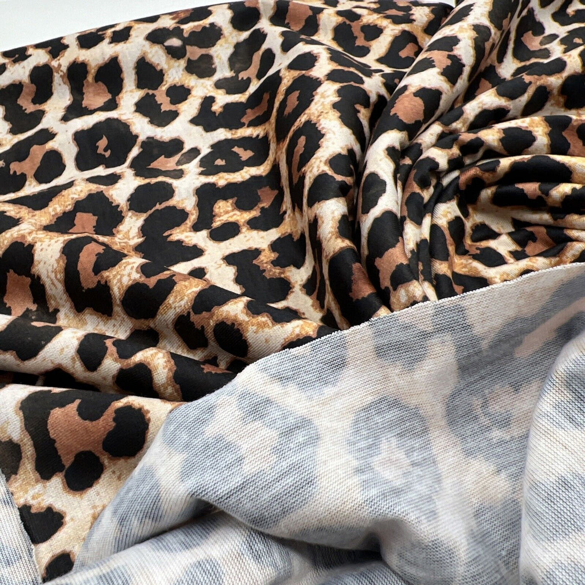 Black Tan Animal Print Spun Poly Stretch Fabric