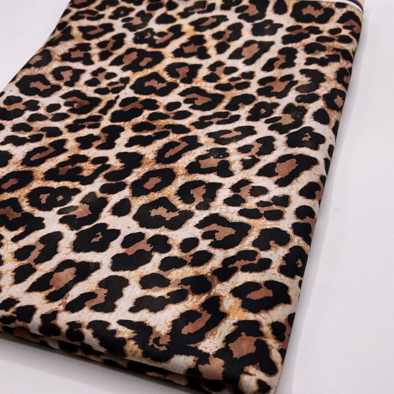 Black Tan Animal Print Spun Poly Stretch Fabric