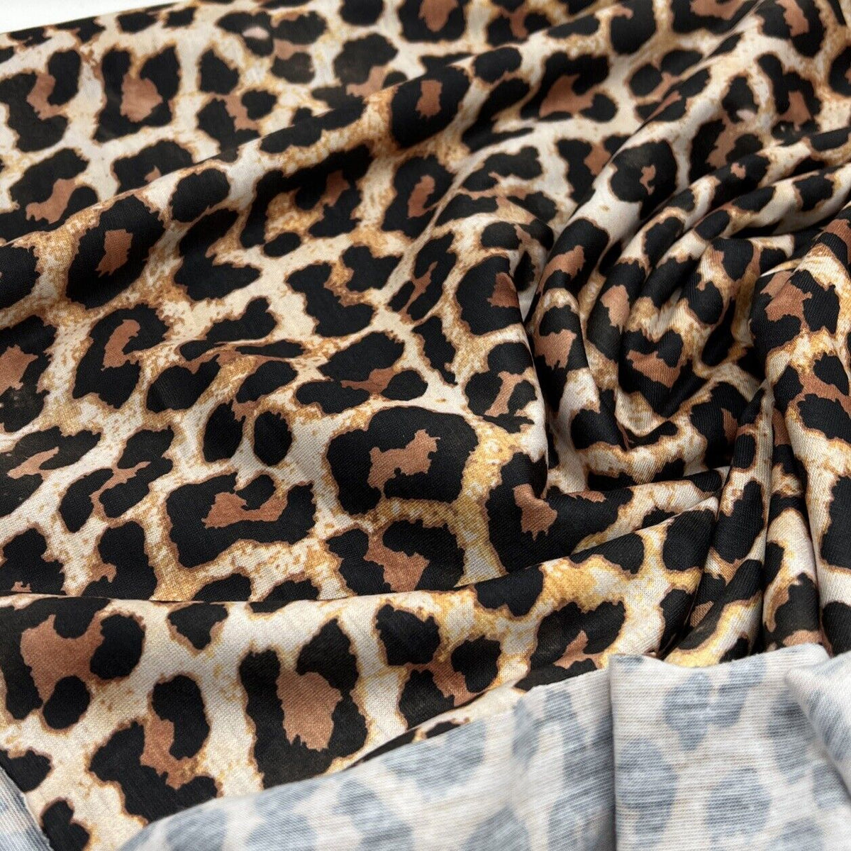 Black Tan Animal Print Spun Poly Stretch Fabric