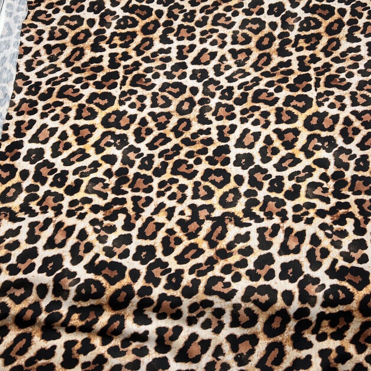 Black Tan Animal Print Spun Poly Stretch Fabric