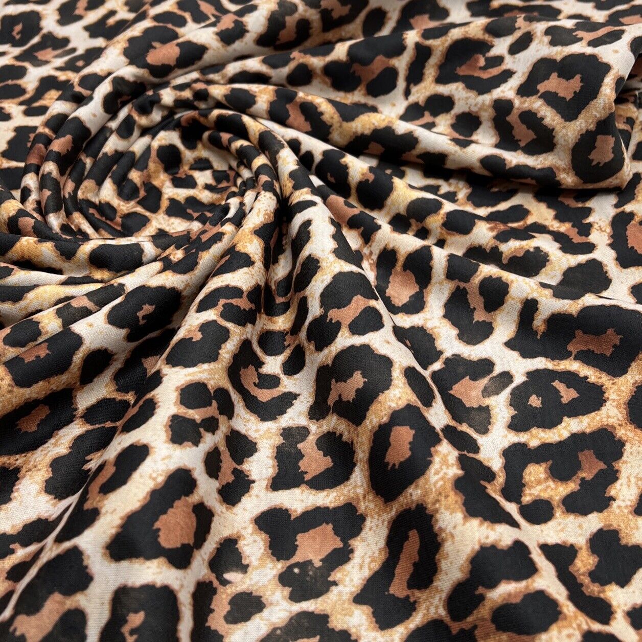 Black Tan Animal Print Spun Poly Stretch Fabric