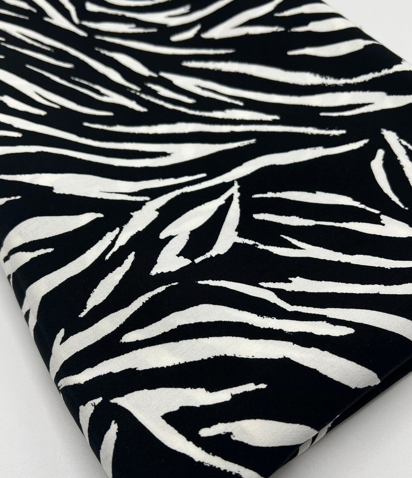 Black Zebra Non Stretch Woven Dress Craft Fabric