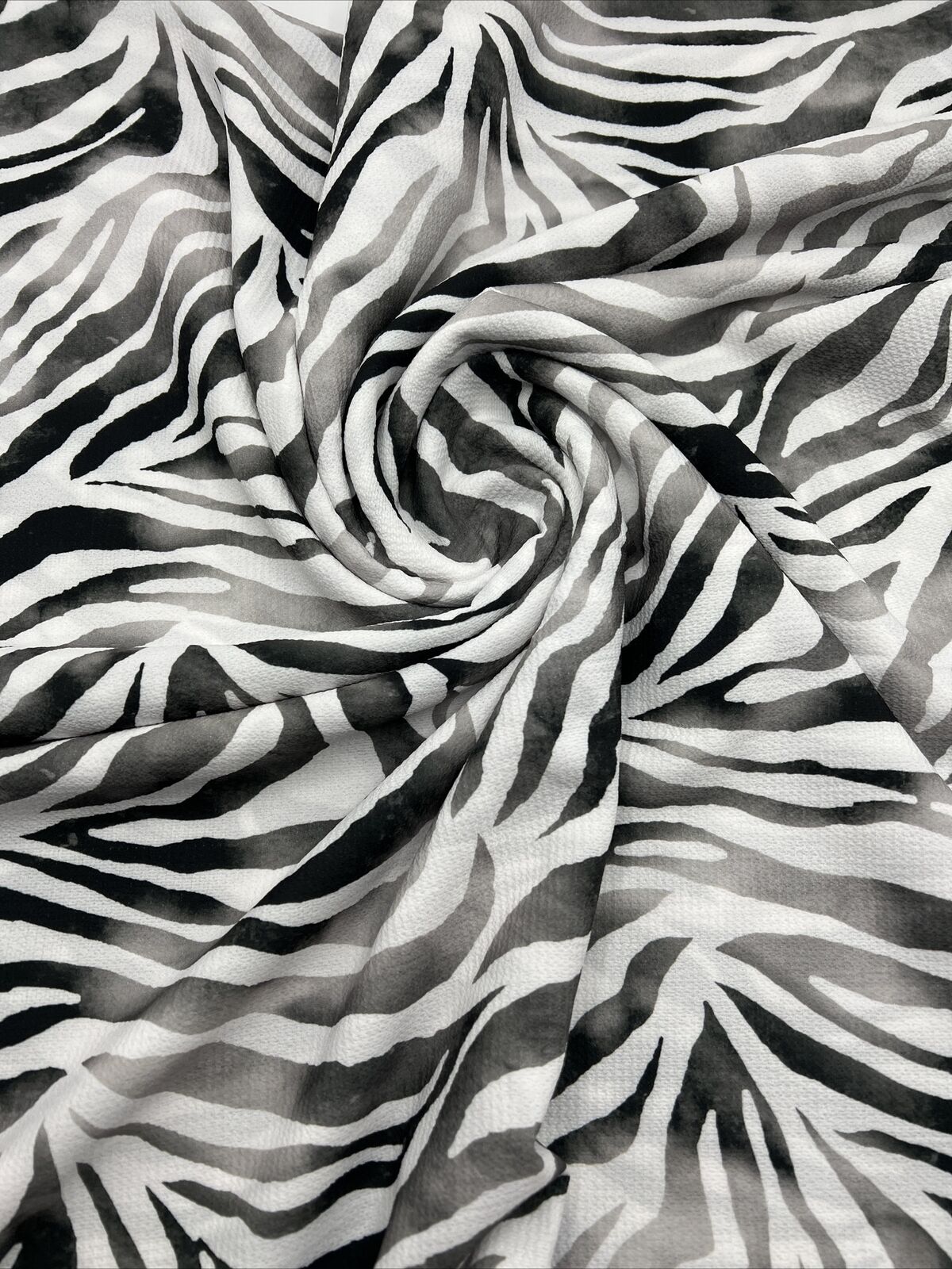 Black Zebra Print Lightweight Bubble Crepe Non Stretch Fabric