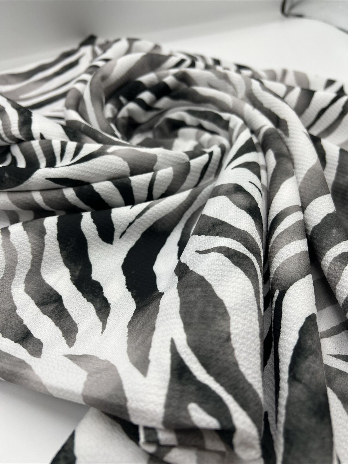 Black Zebra Print Lightweight Bubble Crepe Non Stretch Fabric