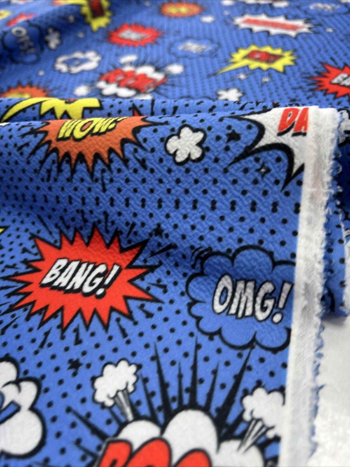 Blue Comic Print Liverpool Bullet Stretch Fabric