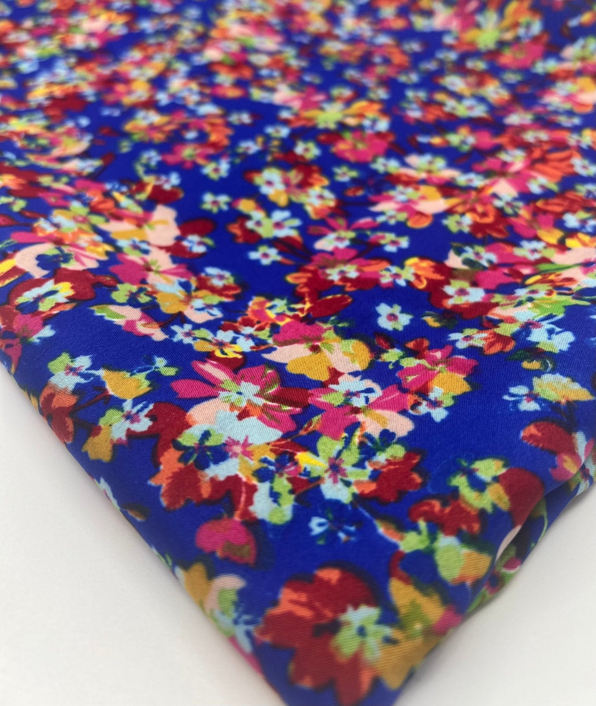 Blue Ditsy Floral Lightweight Non Stretch Woven Fabric
