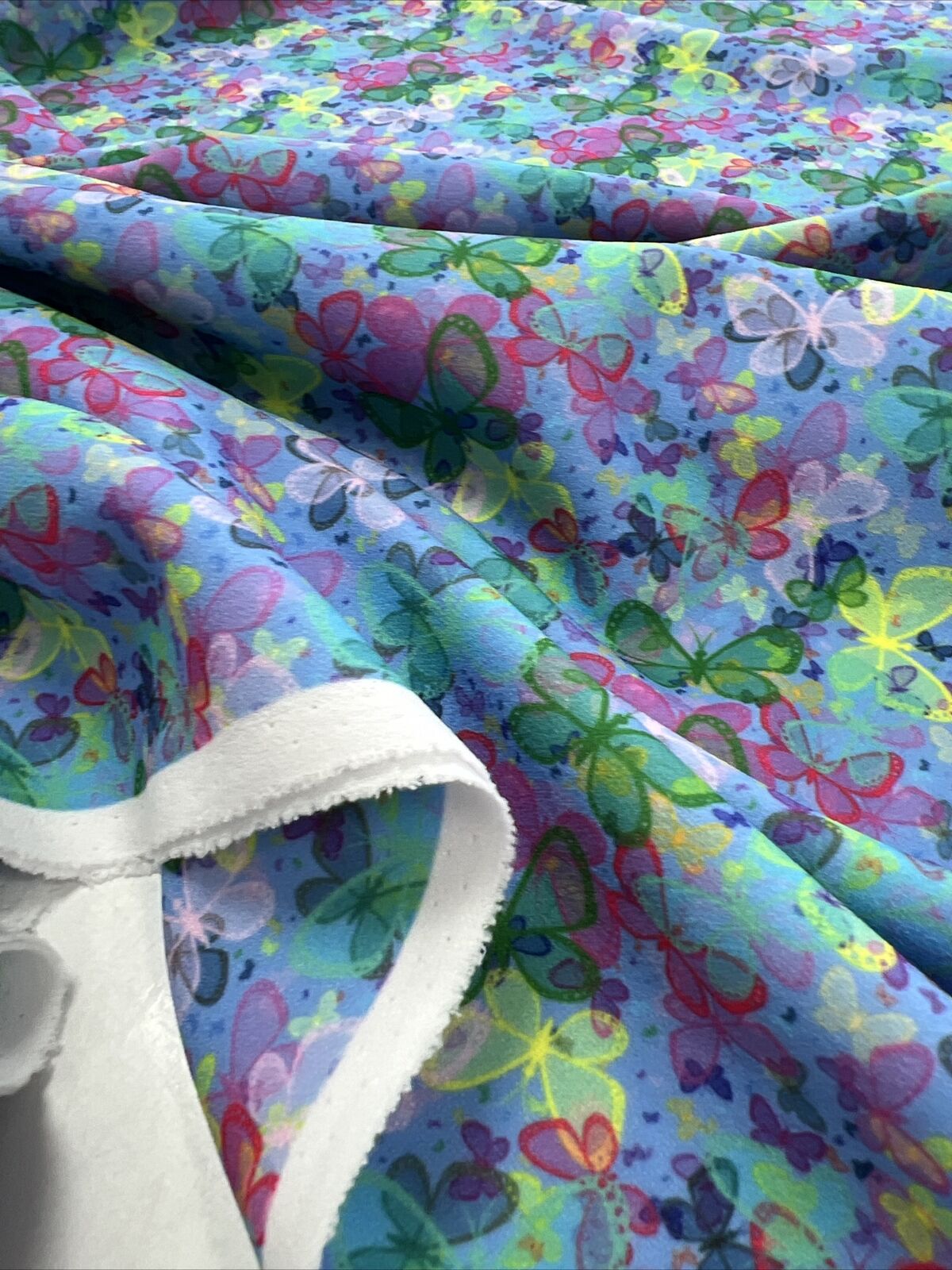 Blue Multi Butterfly Printed Scuba Crepe Jersey Fabric 4 Way Stretch